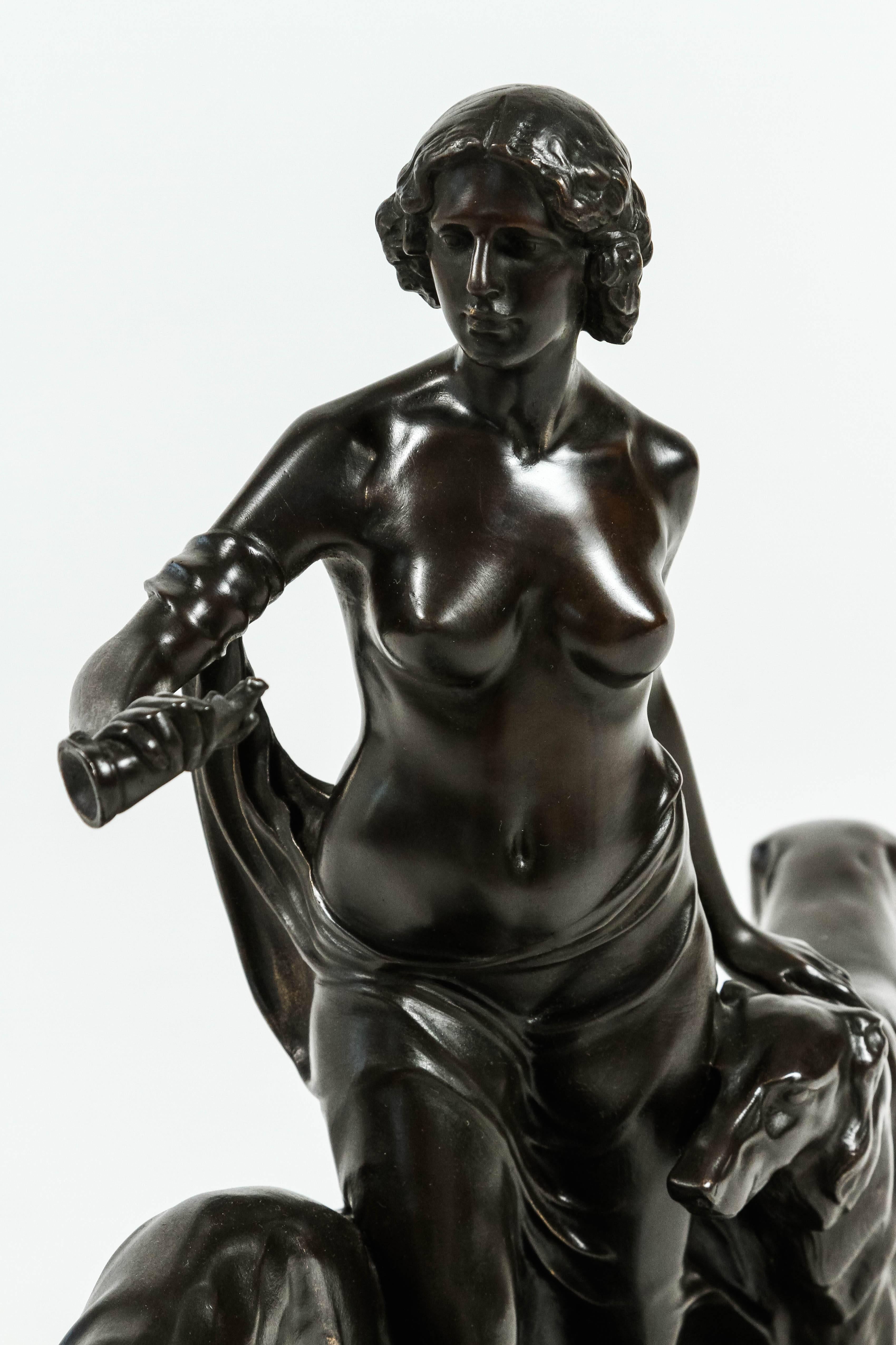 A striking example of the German aesthetic during the Art Deco period. Diana the huntress, horn in hand leading the hounds to the hunt.
A rich almost black patina is in place almost giving the appearance of polished stone. Not much is known about