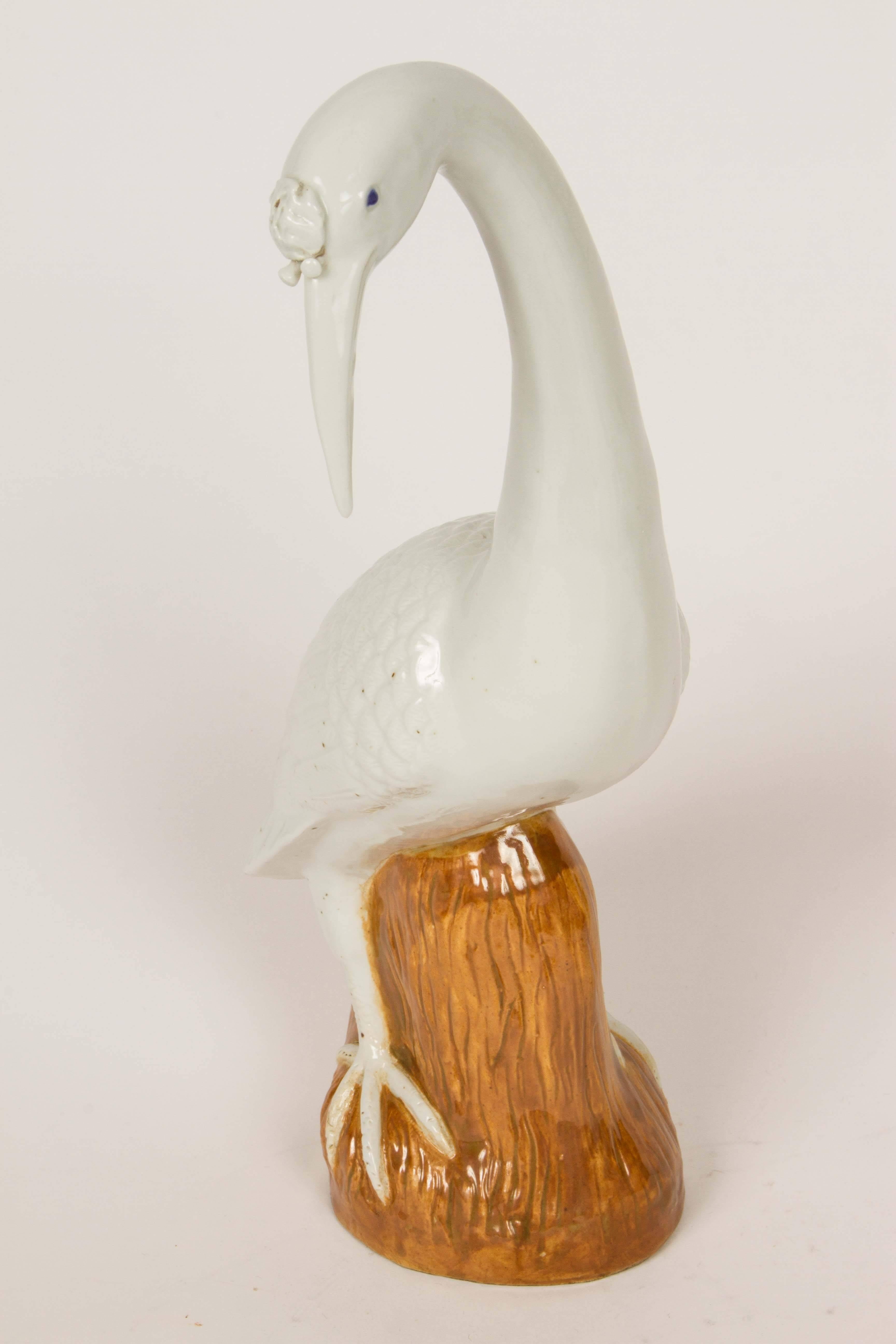 Very elegant group of decorative, painted porcelain egrets. There is some speckling to the glaze and bases are hollow and unsigned. Of typical Chinese form.