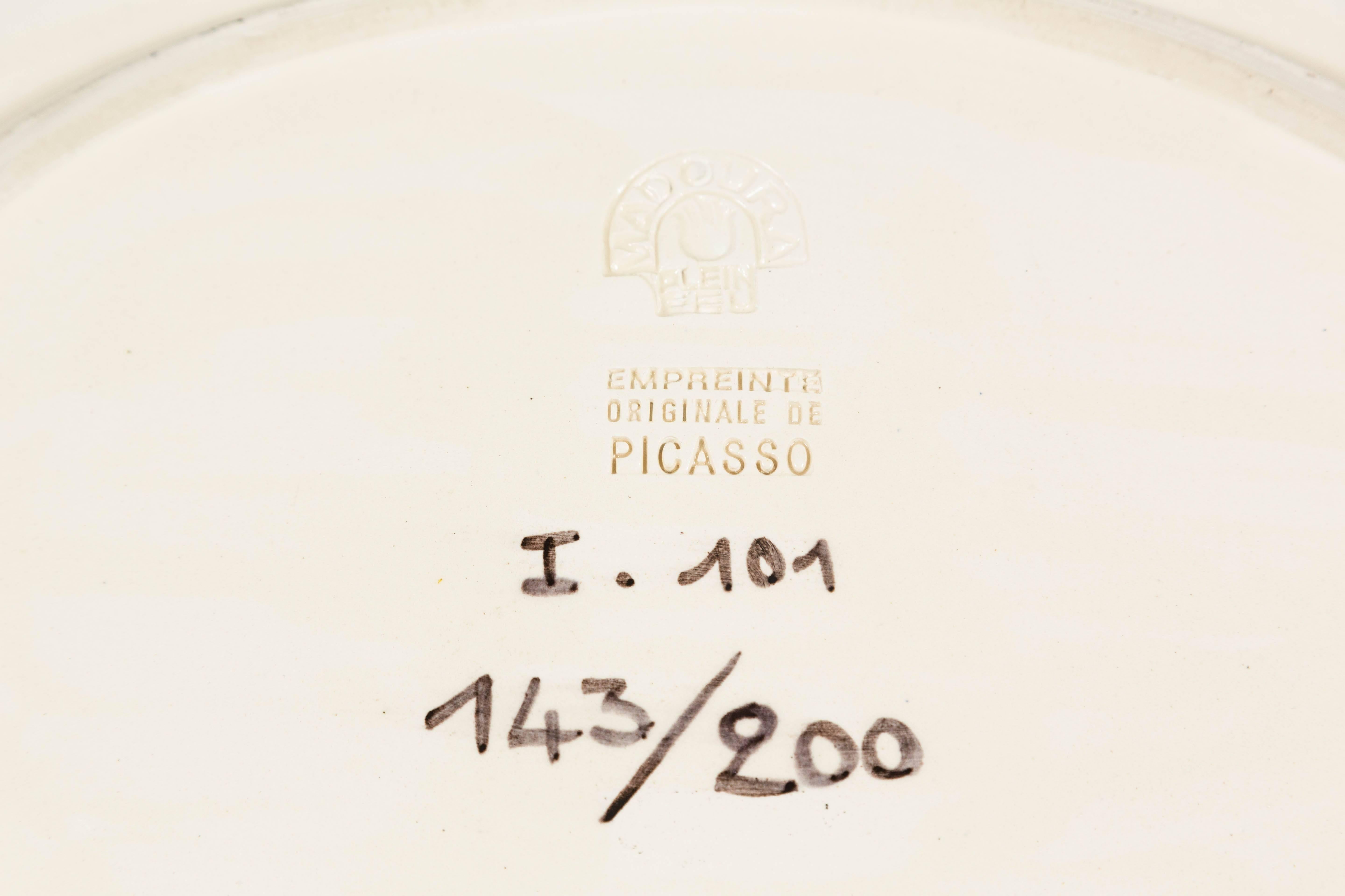 Beautiful 'Poisson Bleu' Madoura ceramic plate, by Pablo Picasso. Partial glazed ceramic plate, numbered from the edition of 200. White earthenware clay, decorated in engobes and enamel. Underglaze blue, green, and black. Marked, stamped, and