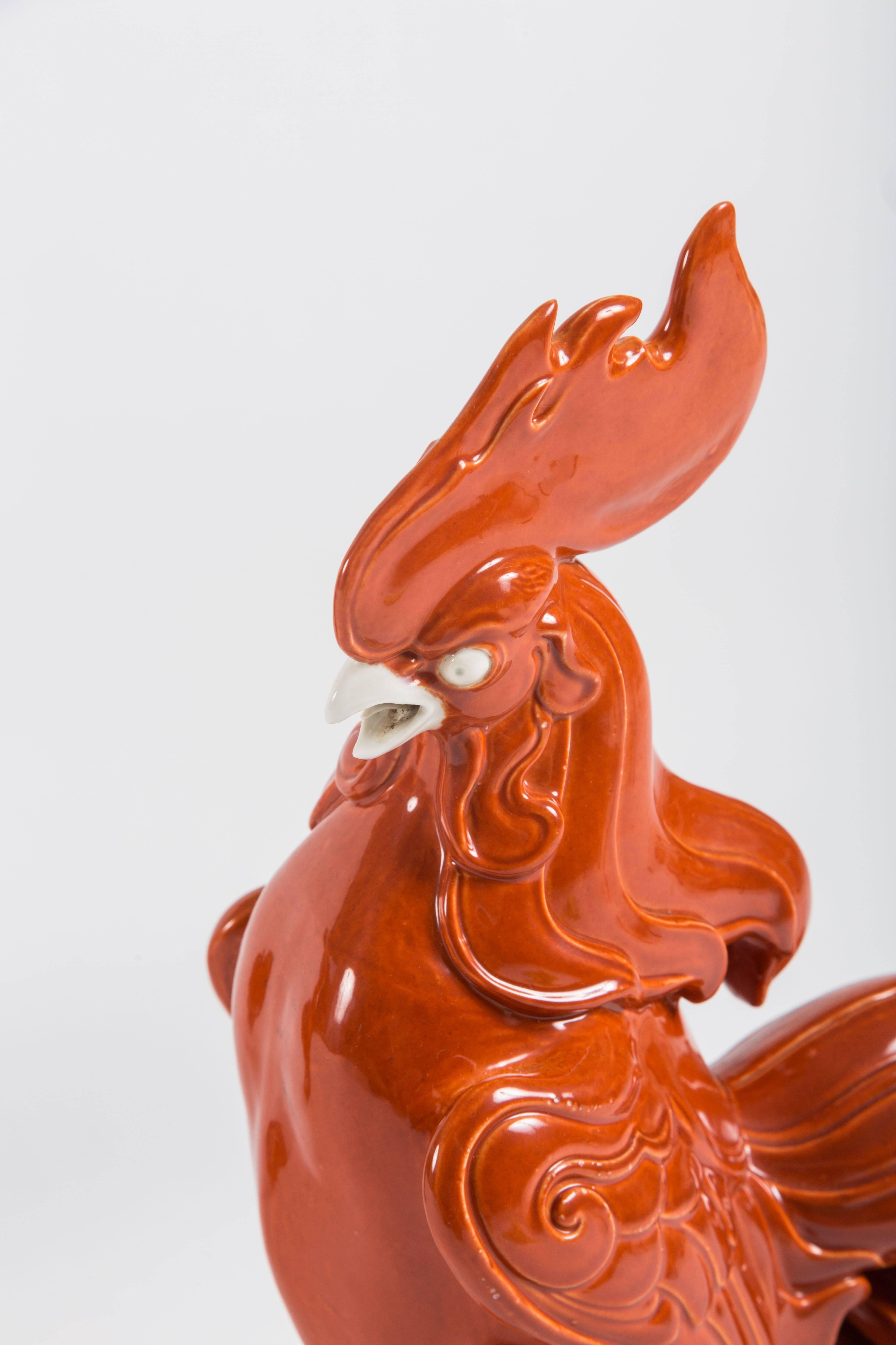 Glazed Pair of Stylized Chinese Export Porcelain Roosters in Cinnabar Glaze