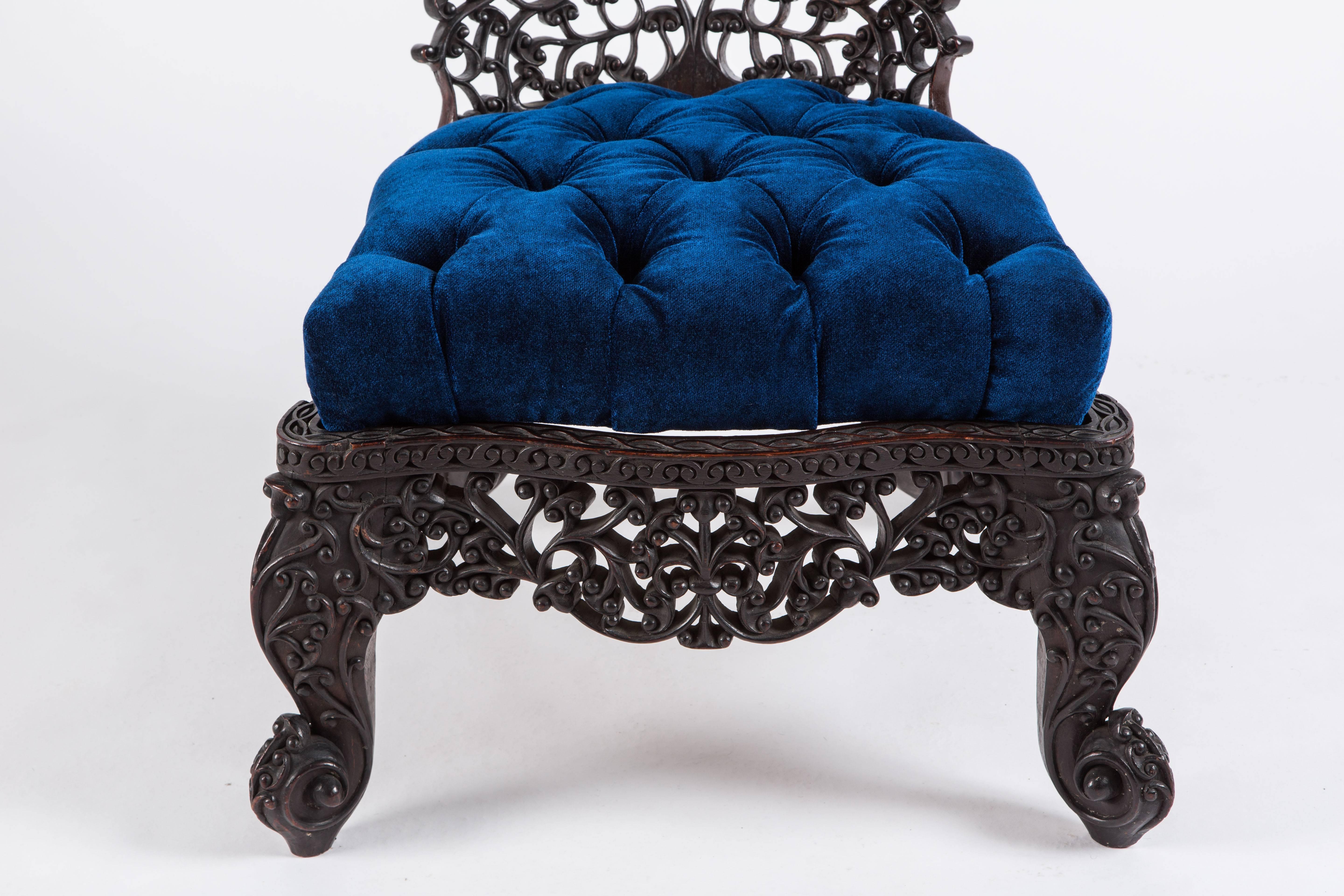 Upholstery Intricately Carved Anglo-Indian Low Chair