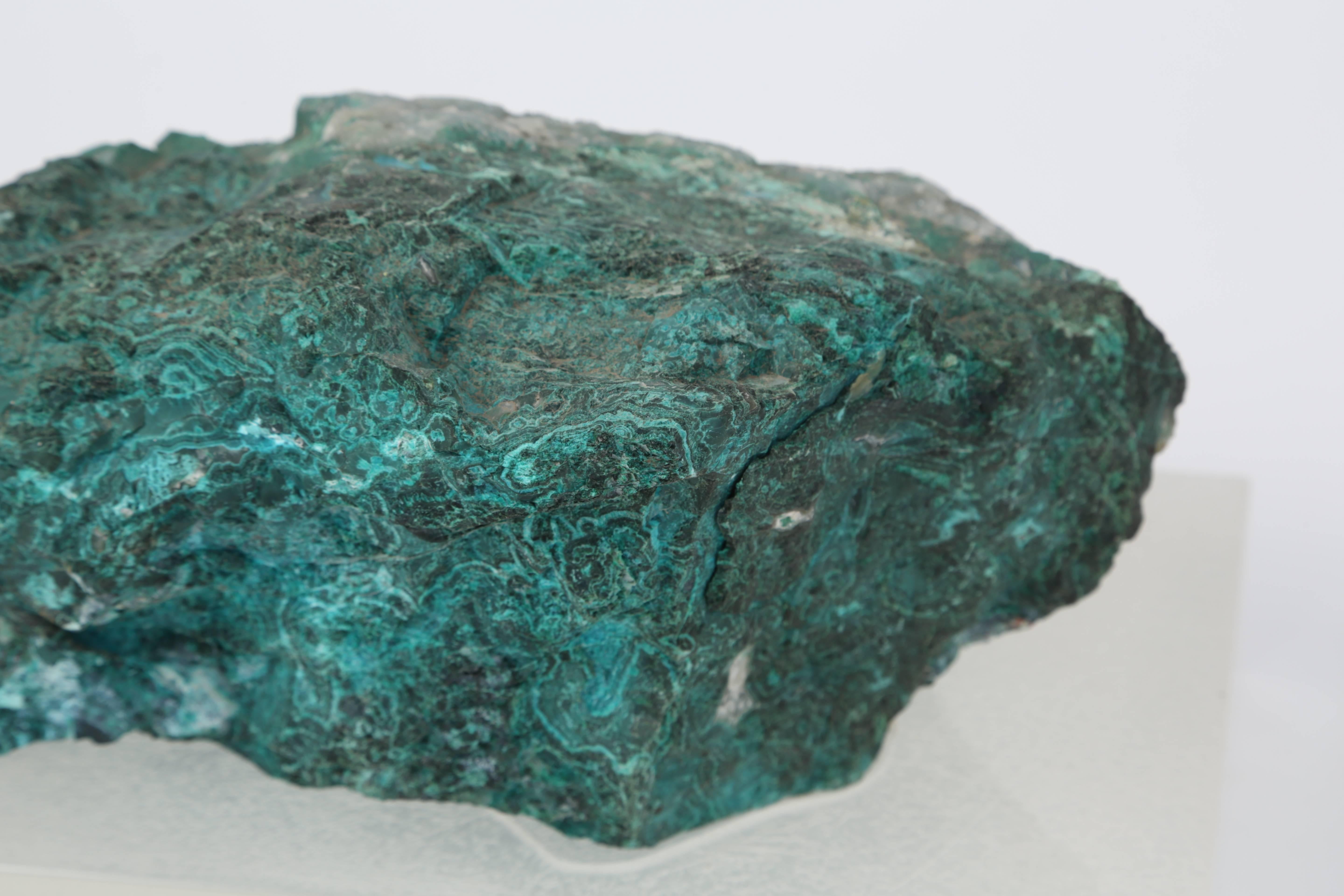 Carved Large Malachite Specimen on Lucite Plinth from the Brody House