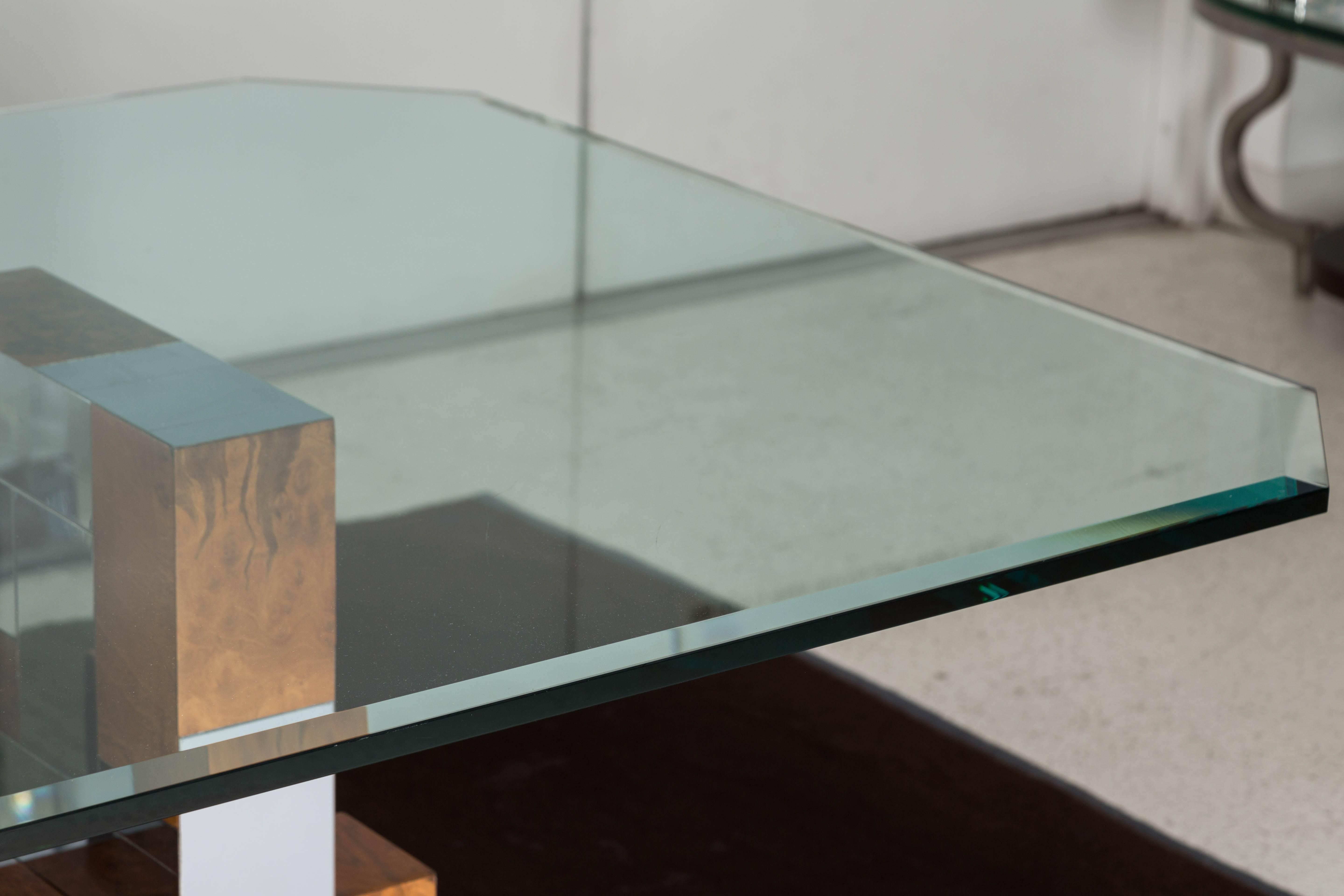 Magnificent dining table in burl walnut, chrome-plated steel and glass from Paul Evans Cityscape Series designed for the Directional Furniture Co. The measurements listed below are for the overall size of the tabletop. The base itself measures