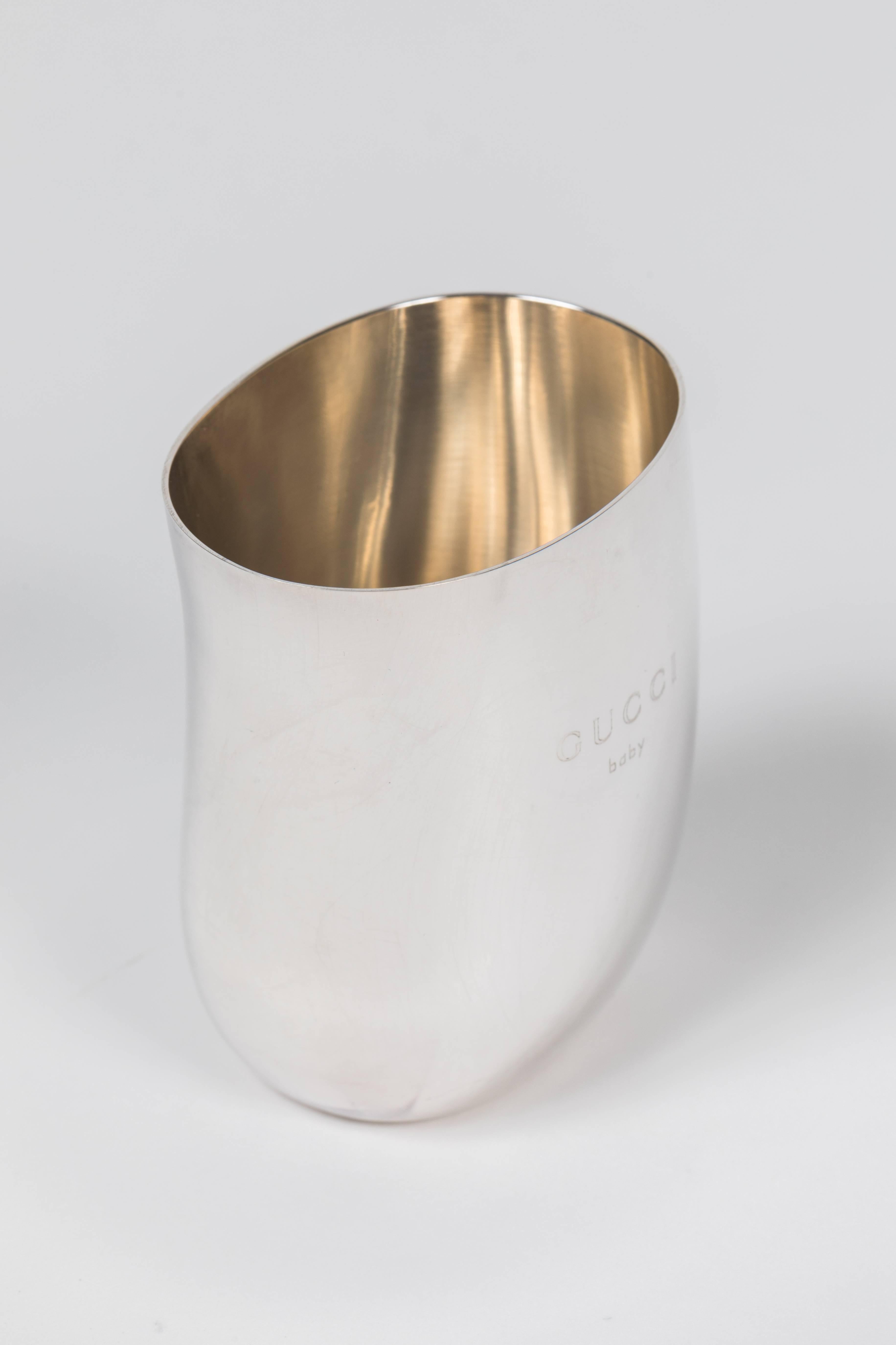 From the Tom Ford era at Gucci, this sterling silver cup is engraved 