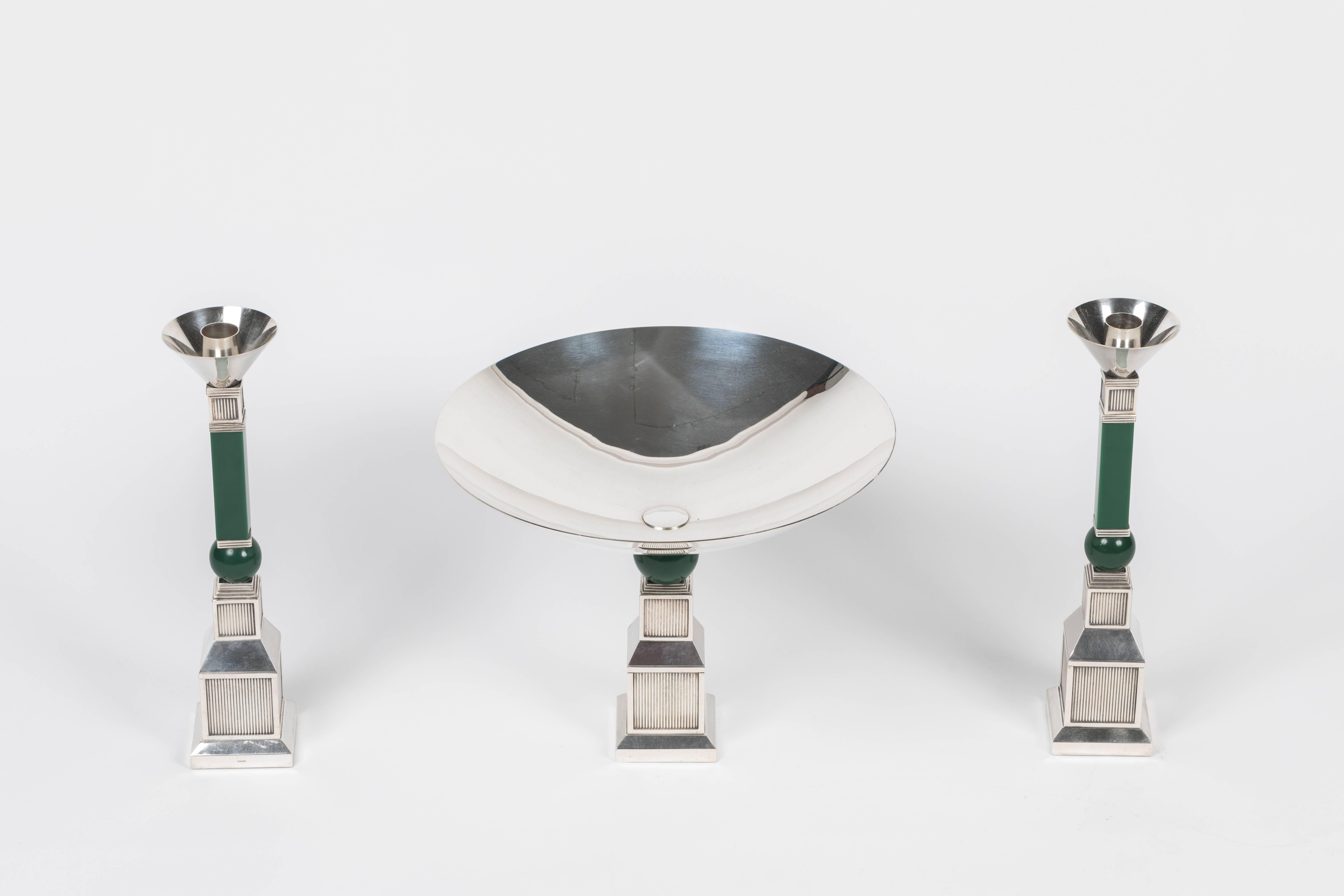 This is a rare opportunity to purchase this period Gucci table garniture consisting of a compote and a pair of candlesticks. Created in the 1970s when the interest in the Art Deco was high this set takes its design cues from that wonderful period.