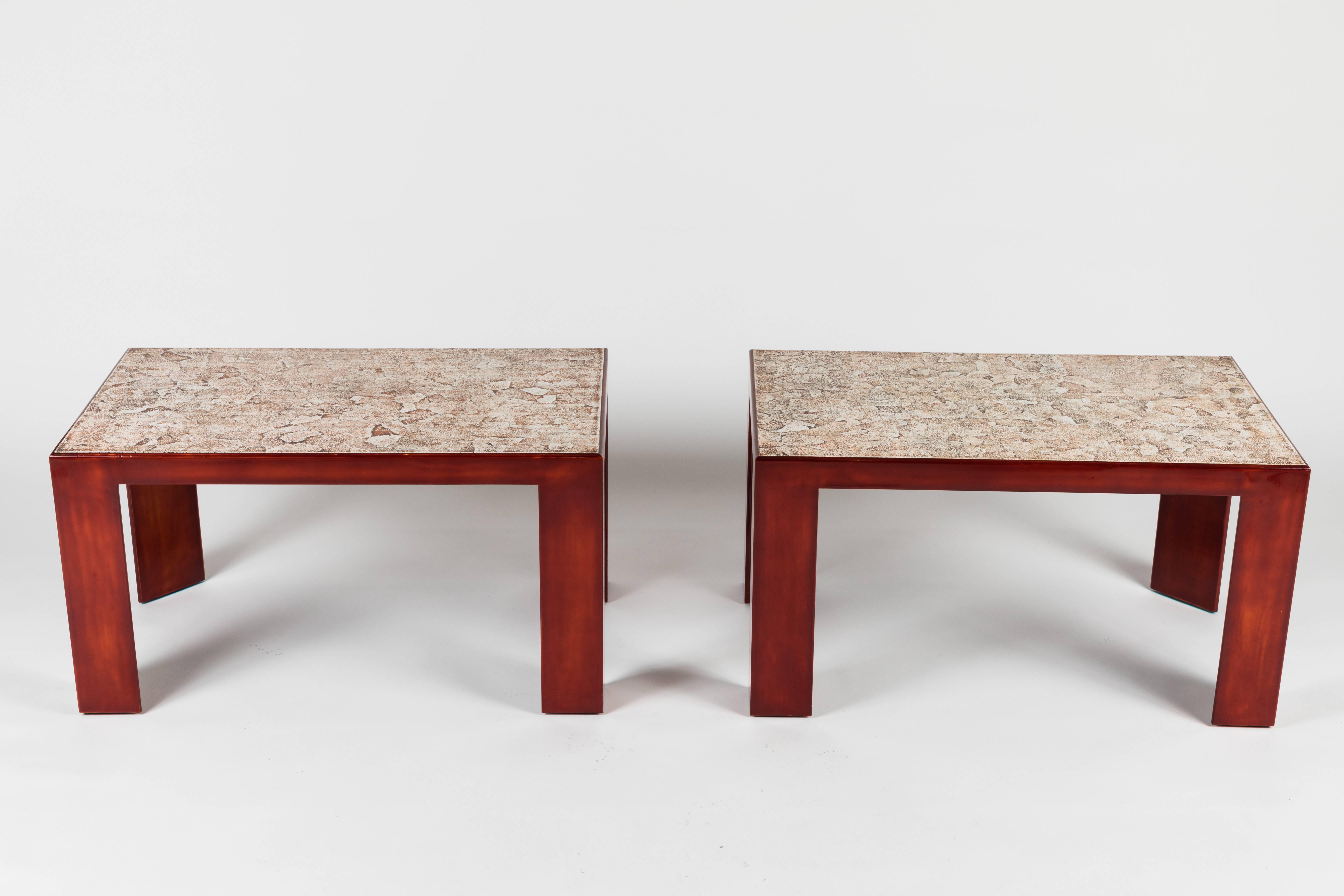 Beautiful pair of Parsons-style side tables In the Art Deco style with a beautiful Cinnabar lacquer finish.  The tops of the tables feature Eggshell lacquer.  These tables are stamped to the underside “Decorative Arts Studio 92 Moss”.