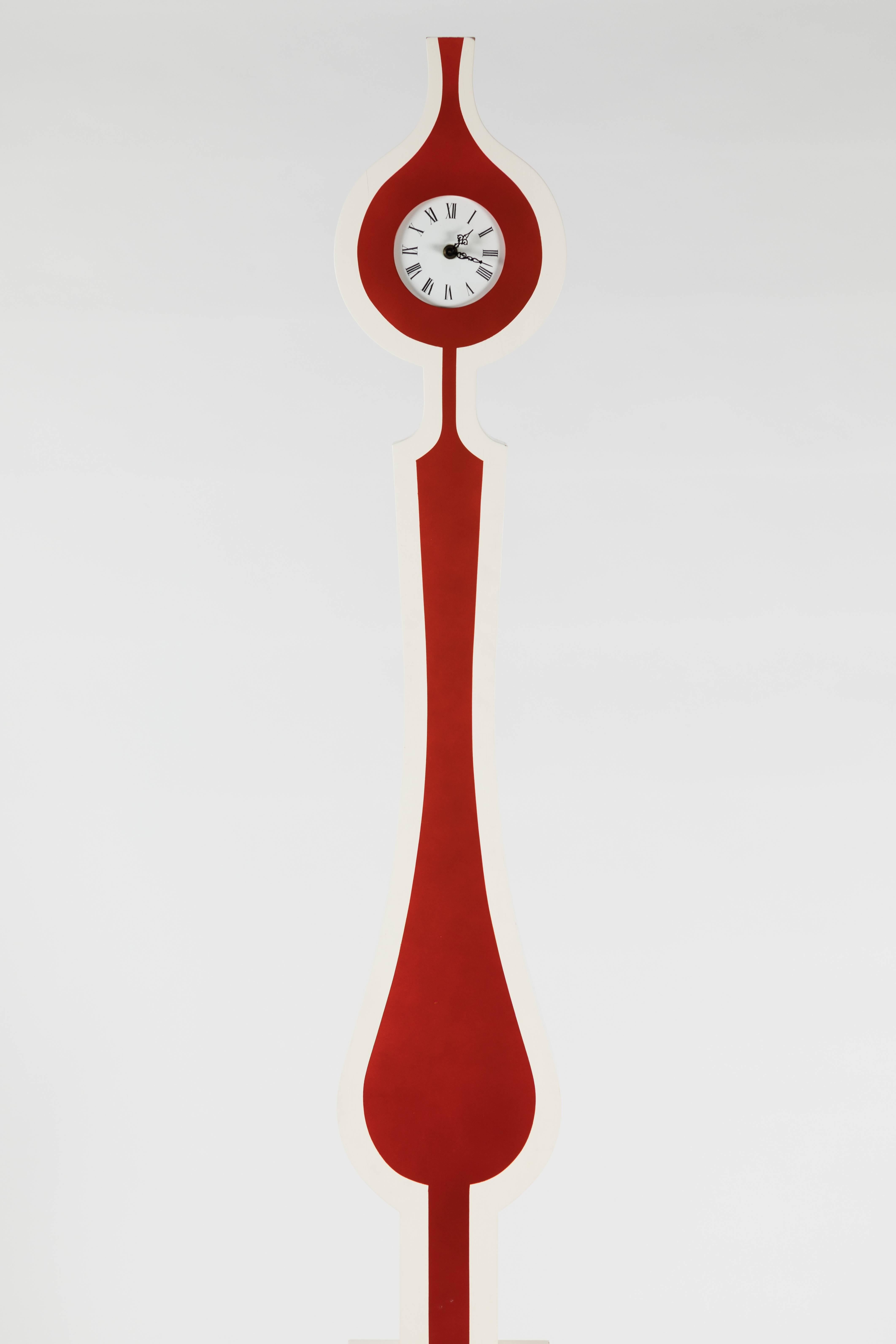A truly rare find, this electric clock with the original finish is a standout.
Brilliant red enamel outlined in white enamel finishes the exterior case of the clock, while the original electronic movement has a traditional enameled face. The