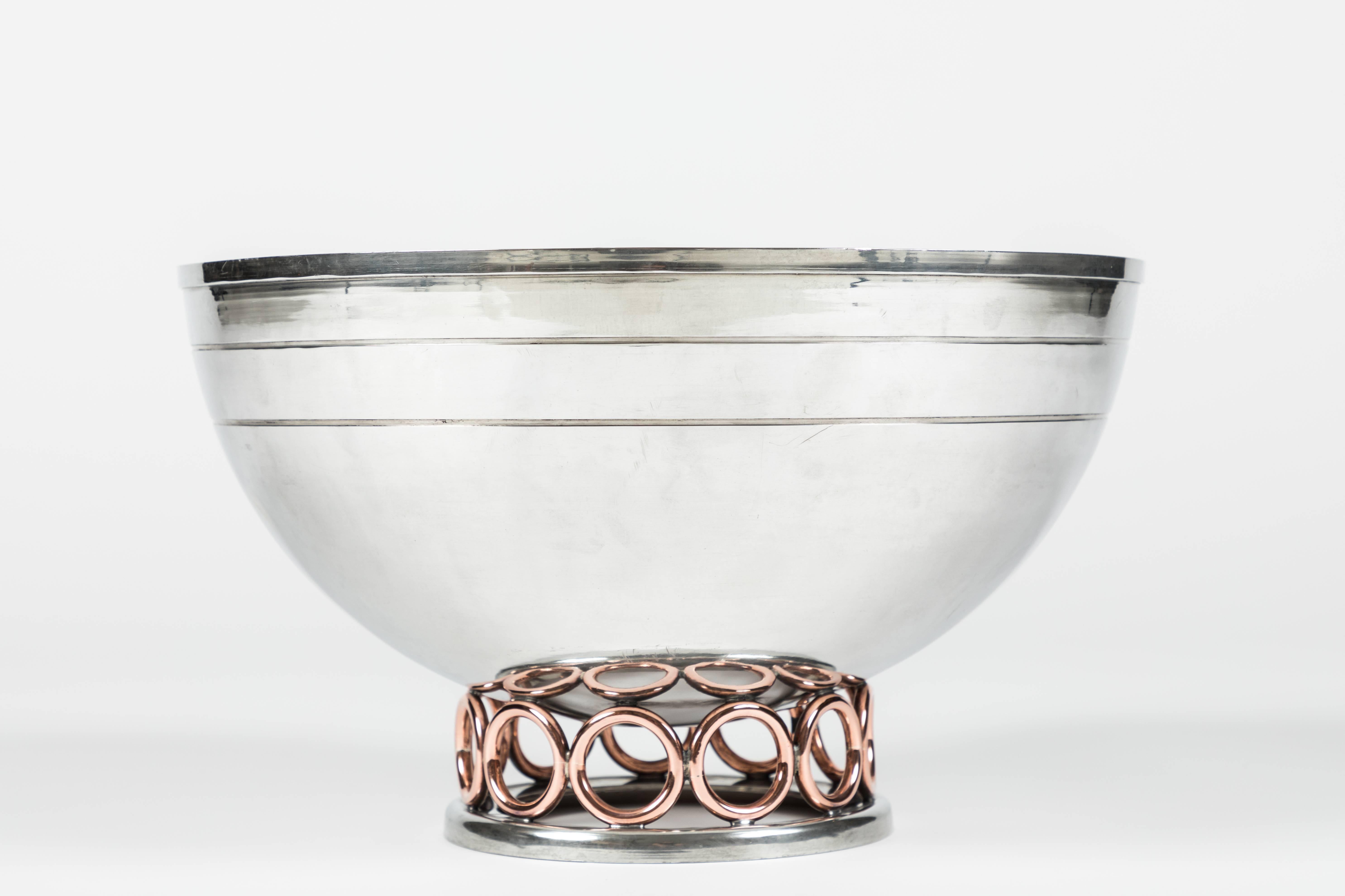 A large and beautiful bowl made by renowned California metal smith Porter Blanchard. Blanchard learned the trade of the silversmith from his father, George Porter Blanchard in Gardner, Massachusetts. In 1923, Blanchard moved to Burbank, California,