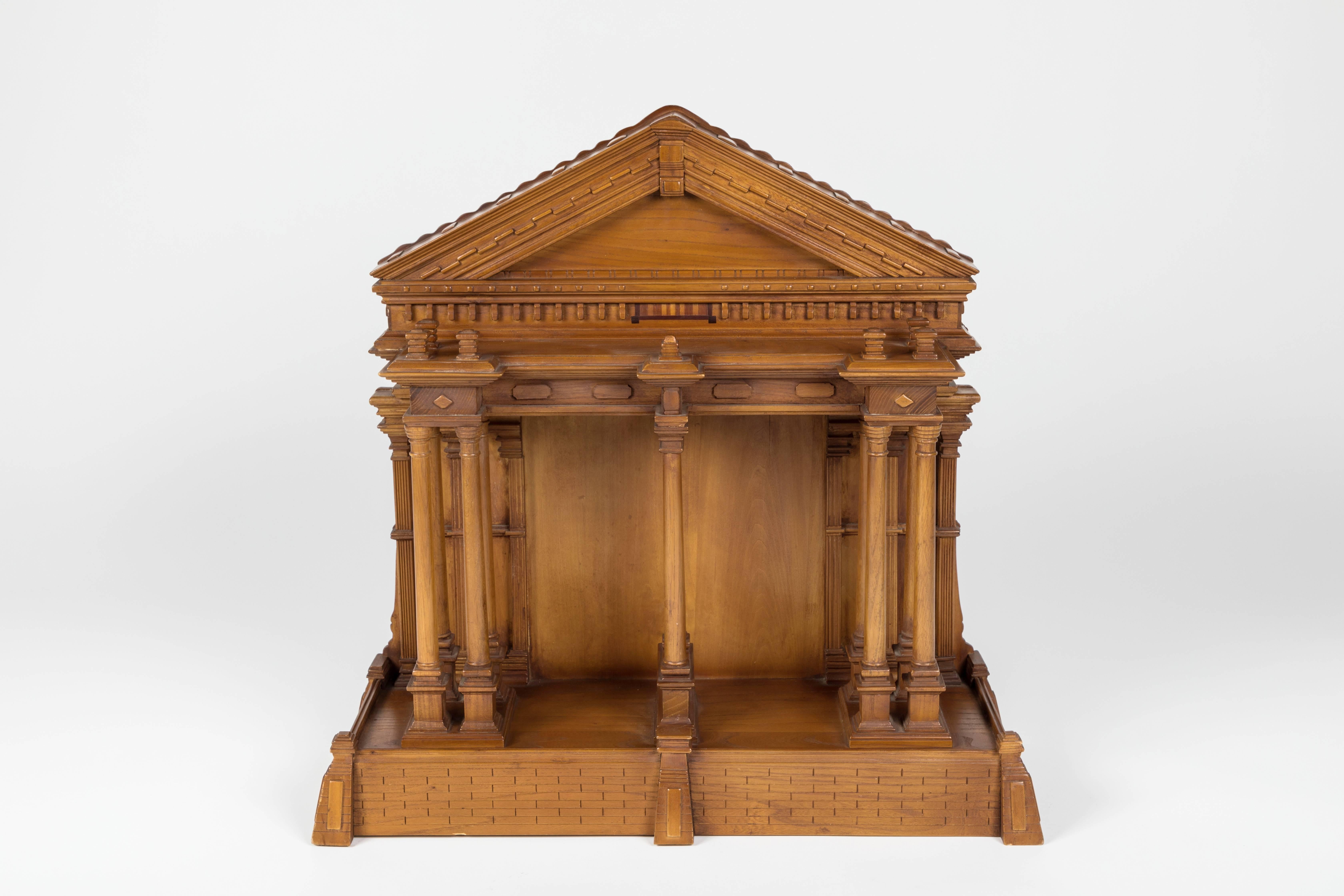 An intricately carved miniature model of the Classical Greek Parthenon. 
This 3-dimentional model has a flat back. 

The Parthenon was built on the Athenian Acropolis, Greece, dedicated to the goddess Athena, whom the people of Athens considered