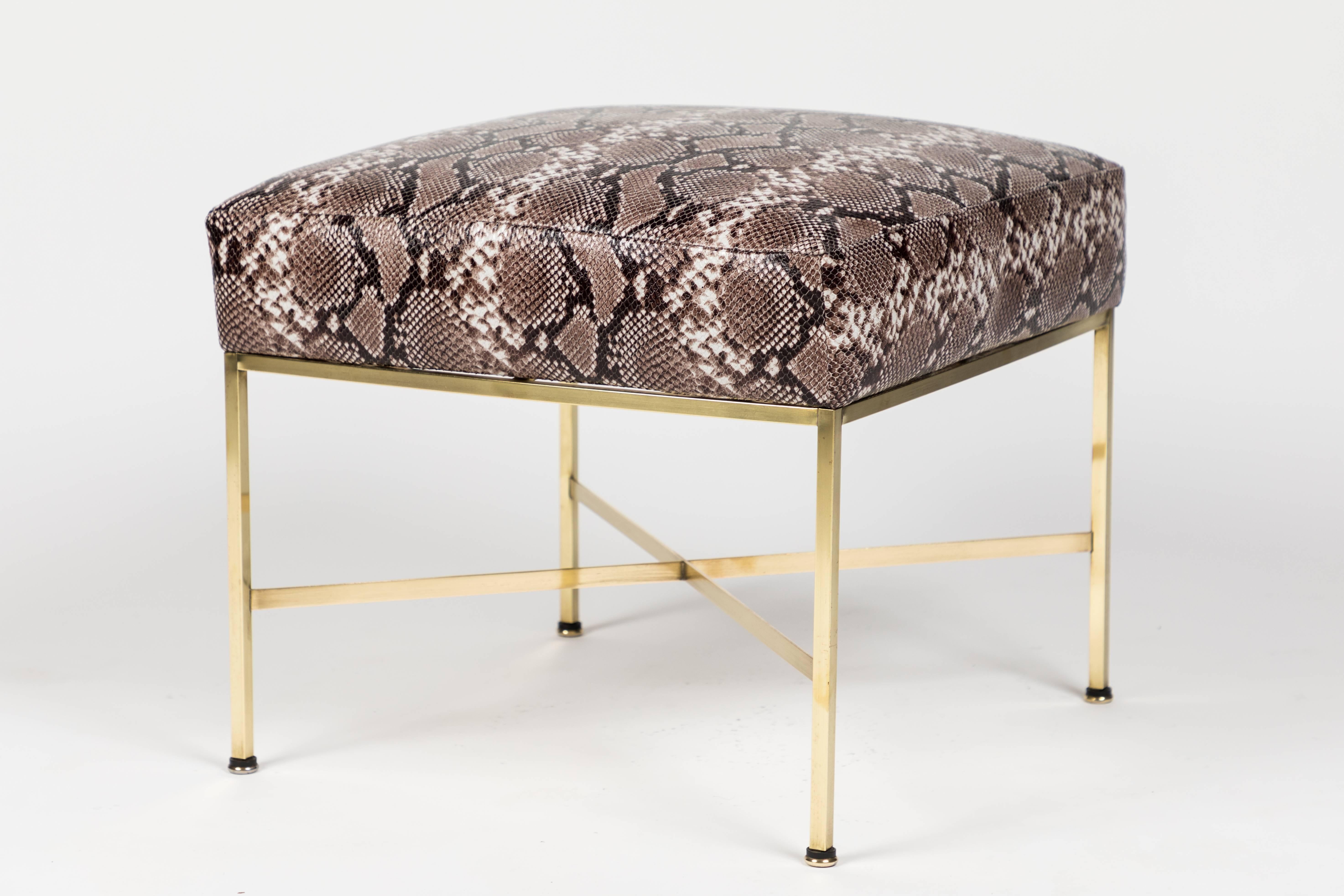 A Classic design, this simple brass X-base stools have been reupholstered in a realistic embossed and printed leather imitating Python. Stools would work perfectly in any number of style interiors.
 
