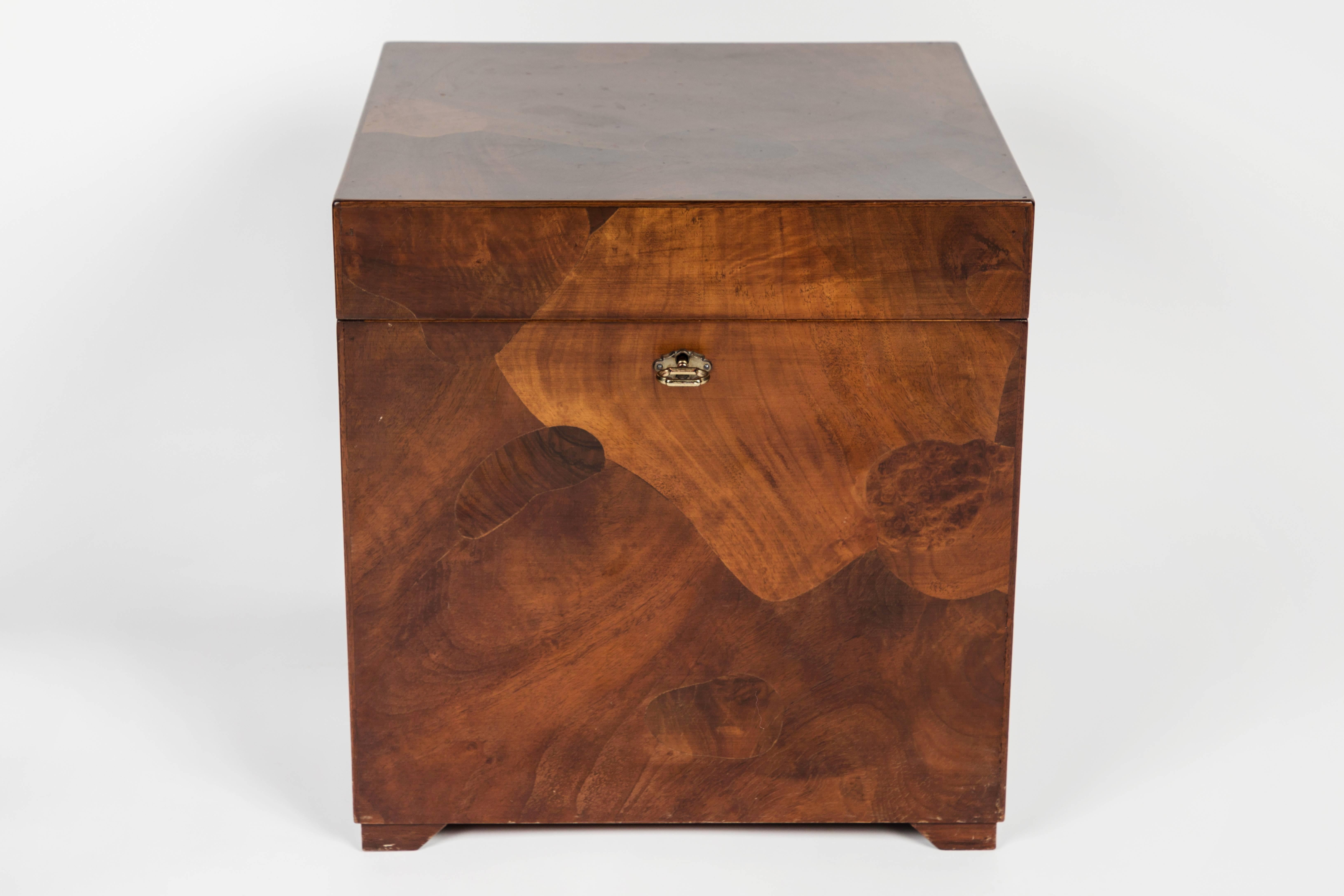 Elegant campaign chest made of beautiful Olivewood burl and brass fittings making it the perfect addition to any space. The chest has recently been waxed in order to show off the beautiful wood graining and tonality of this piece. The interior is