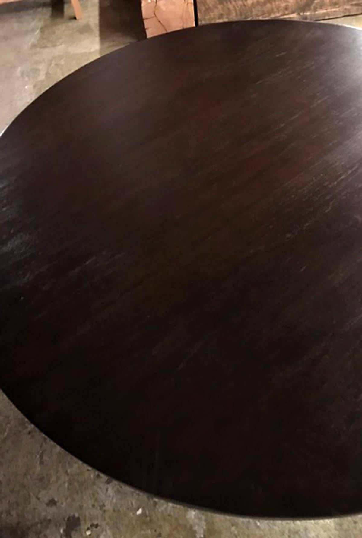 Custom beehive pedestal table. As shown, in 60 inch diameter in walnut with an ebony finish and light distress. This particular piece is available off the floor. Can be made in any size and finish in walnut, oak or mahogany. Bench made in Los