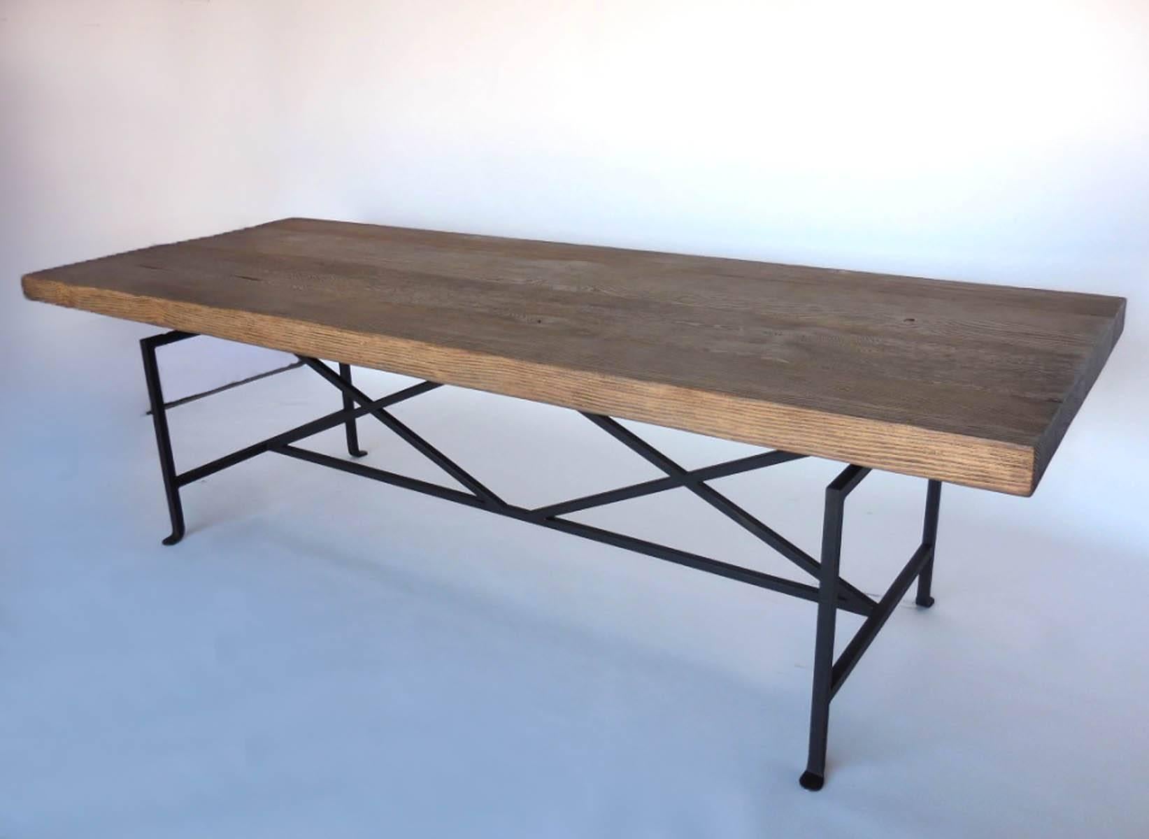 3 inch thick reclaimed wood planks make up the top of this rustic yet modern table. Can be made in any size and in a variety of finishes. As shown in our #6 finish. Natural distress of old wood, knots and old cracks, yet smooth to the