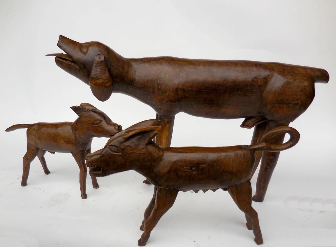 Single dad dog family!
Great carved wooden dogs from Guatemala. Anatomically correct details on faces and bodies! Dad measures 27x6.5x16.75H, female measures 16.50x2.5x10H and male measures 17x4.5x10.25H
These dogs come with a hand forged iron