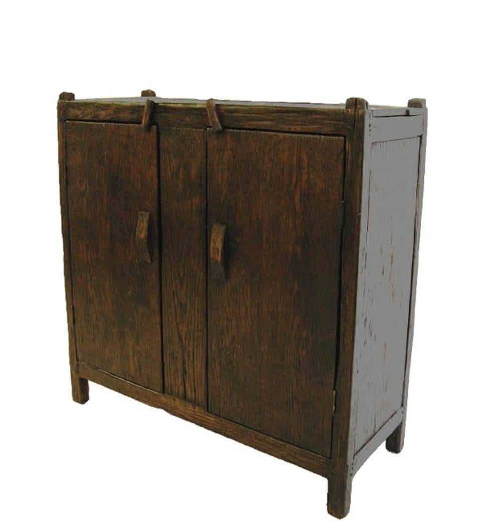 Great rustic cabinet in distressed oak. Shelves and rustic door latches. 
Can be made in custom sizes and finishes. Made in Los Angeles by Dos Gallos Studio. CUSTOM PRICES ARE SUBJECT TO CHANGE. PLEASE INQUIRE BEFORE PLACING AN ORDER. CUSTOM ORDERS