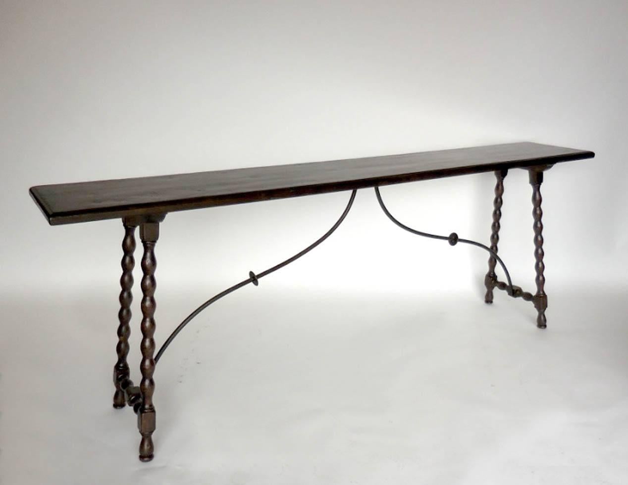Custom walnut bobbin console with iron supports. Thin, gracious profile. Can be made in custom sizes and finishes. Can be made in any size and finish, in oak, mahogany or walnut. Made in Los Angeles by Dos Gallos Studio.  
PRICES ARE SUBJECT TO