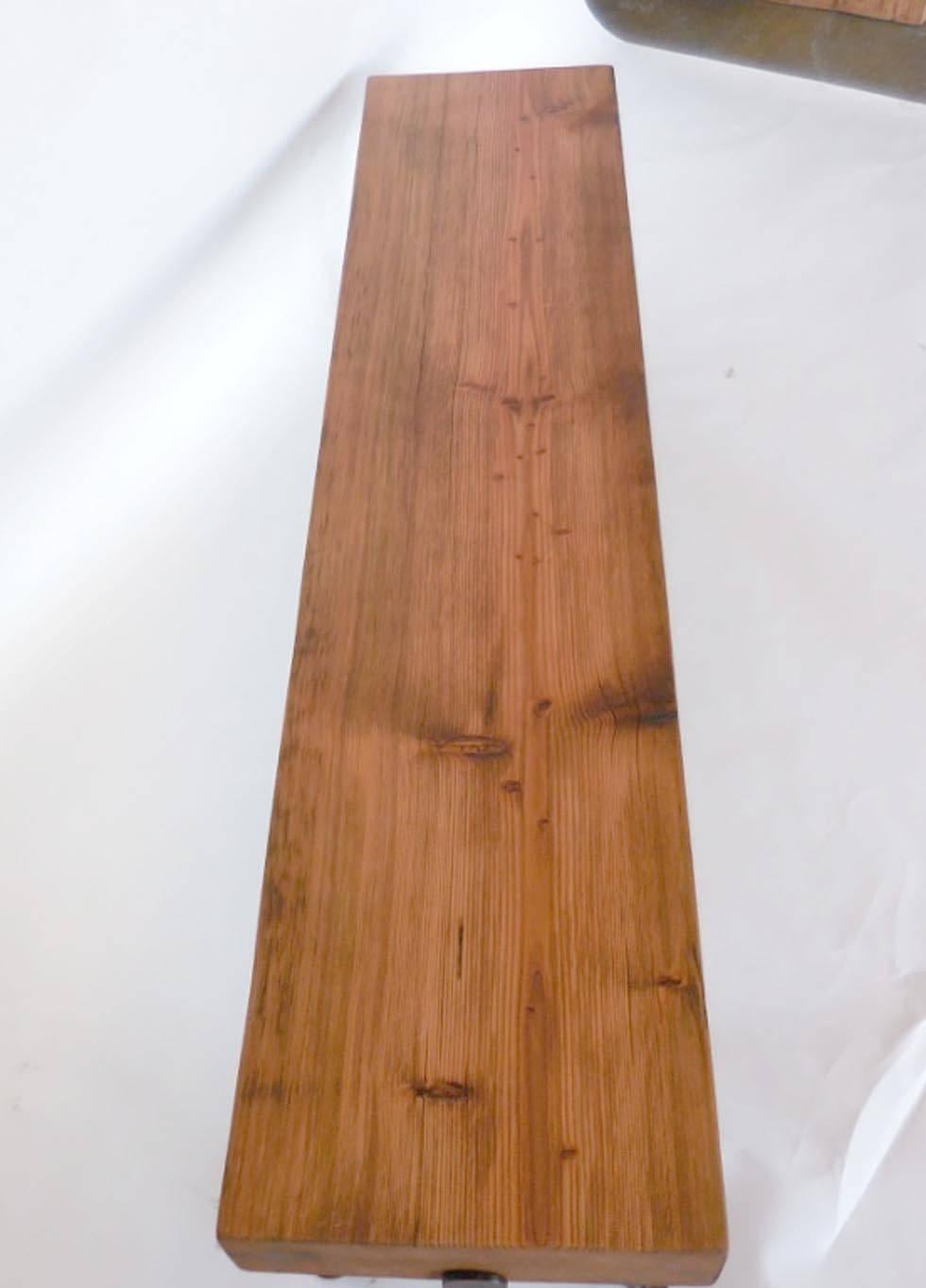Reclaimed natural 100 year old Douglas fir beams atop hand-forged iron base. Can be made in custom sizes.  Made in Los Angeles by Dos Gallos studio.