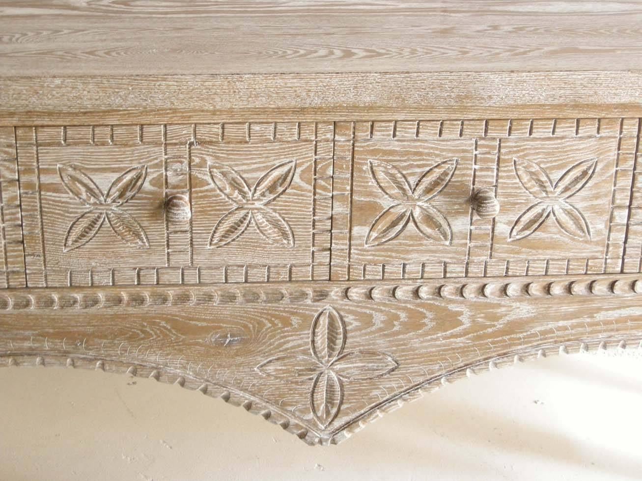 Custom Nahuala console table with intricate carvings and drawers, based on an indigenous Guatemalan Nahuala (animal spirit) table . Available in walnut, oak or mahogany in a variety of colors and finishes. As shown in oak with a ceruse and weathered