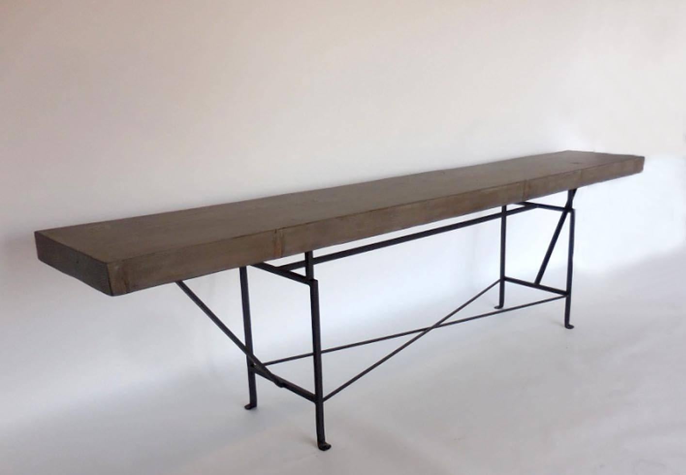 Custom buttress base console. Base is hand-forged iron and top consists of Douglas fir in a custom grey/beige finish. Can be made in any size and in a variety of custom colors/finishes. Dos Gallos Studio.  Made in Los Angeles.
PRICES ARE SUBJECT TO