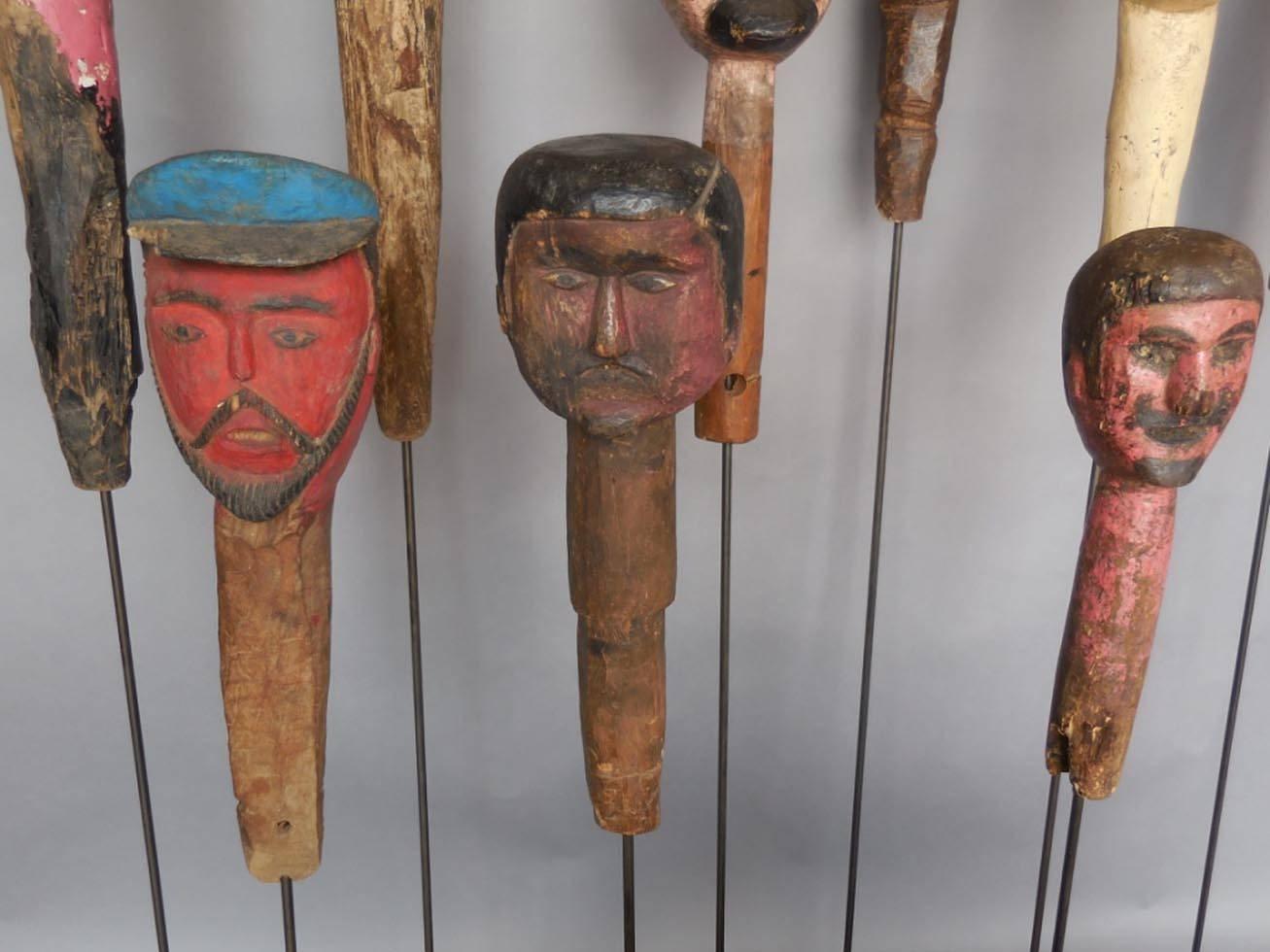Collection of antique Gigantes (giant) heads from Guatemala. Carved wood heads held by indigenous people on stilts, dressed in long robes to depict giants in ceremonial processions. Priced and sold separately, but look great as a grouping.
Ranging