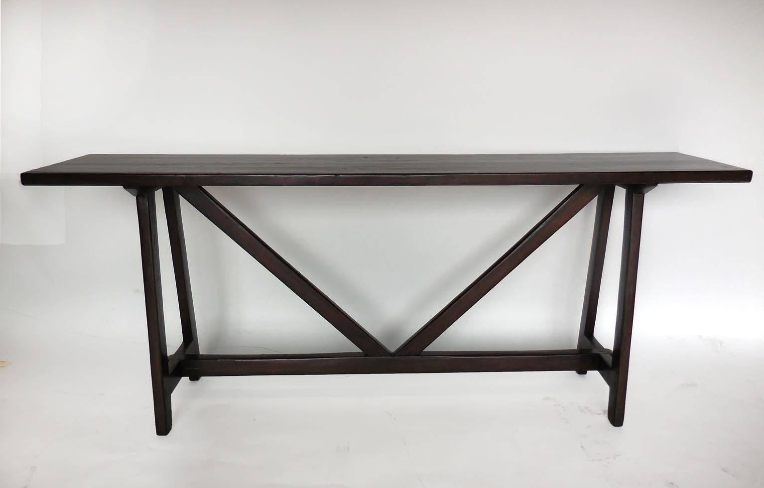 Custom console table. Can be made in any size, in Oak, Walnut or Mahogany in a variety of finishes. Shown here in Walnut with a light distress and dark finish. Made in Los Angeles by Dos Gallos Studio.
PRICES ARE SUBJECT TO CHANGE. PLEASE INQUIRE