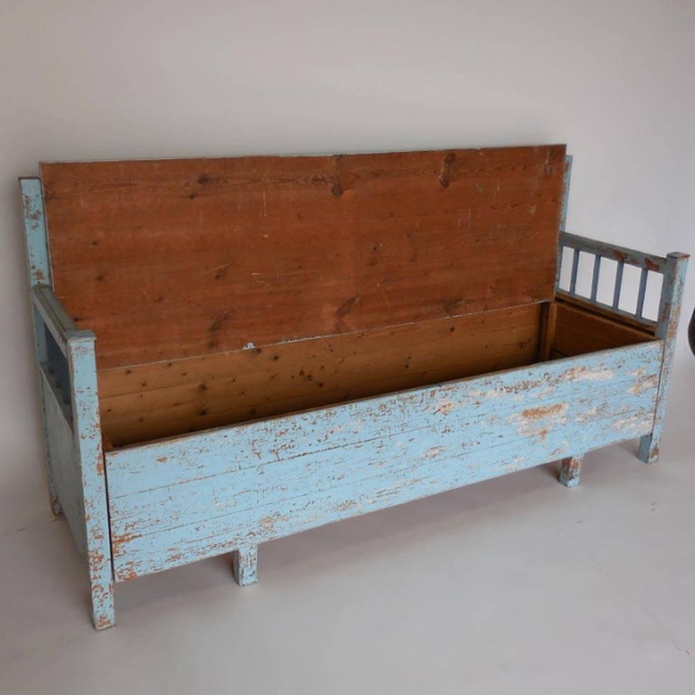 Traditional Swedish kitchen sofa/pullout bed, used by the family milk maid. Top lift up and front can also be pulled forward to created a wider bed. Old blue paint, great worn patina.