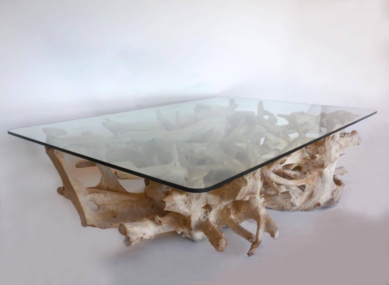 Fabulous light color/driftwood teak root base with intertwining different size roots. Very sculptural. Glass top is rectangular and is 1/2
