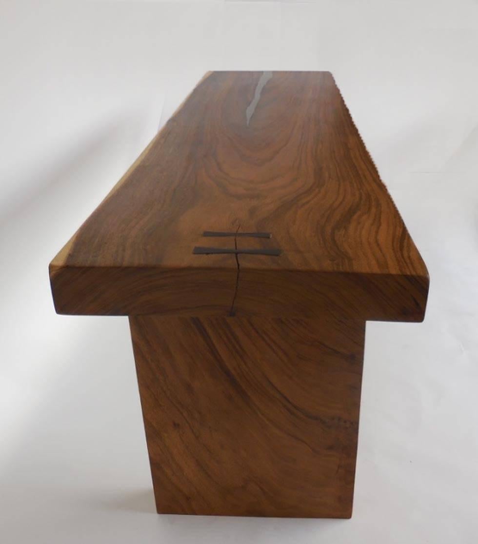 Stunning 3 3/4" thick slabs of Albezia wood, African tropical hardwood, fashioned into a modern sleek console table. Top has pewter inlay and two hand-forged iron mariposas (butterflies). Wood has beautiful variations and graining. One of a