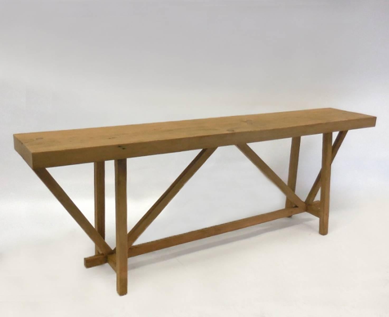 Douglas fir wood console table with buttress style base. Top measures about 2.75 inches to 3 inches thick. Can also be made in custom sizes and finishes.  Made in Los Angeles by Dos Gallos Studio.
PRICES ARE SUBJECT TO CHANGE. PLEASE INQUIRE BEFORE