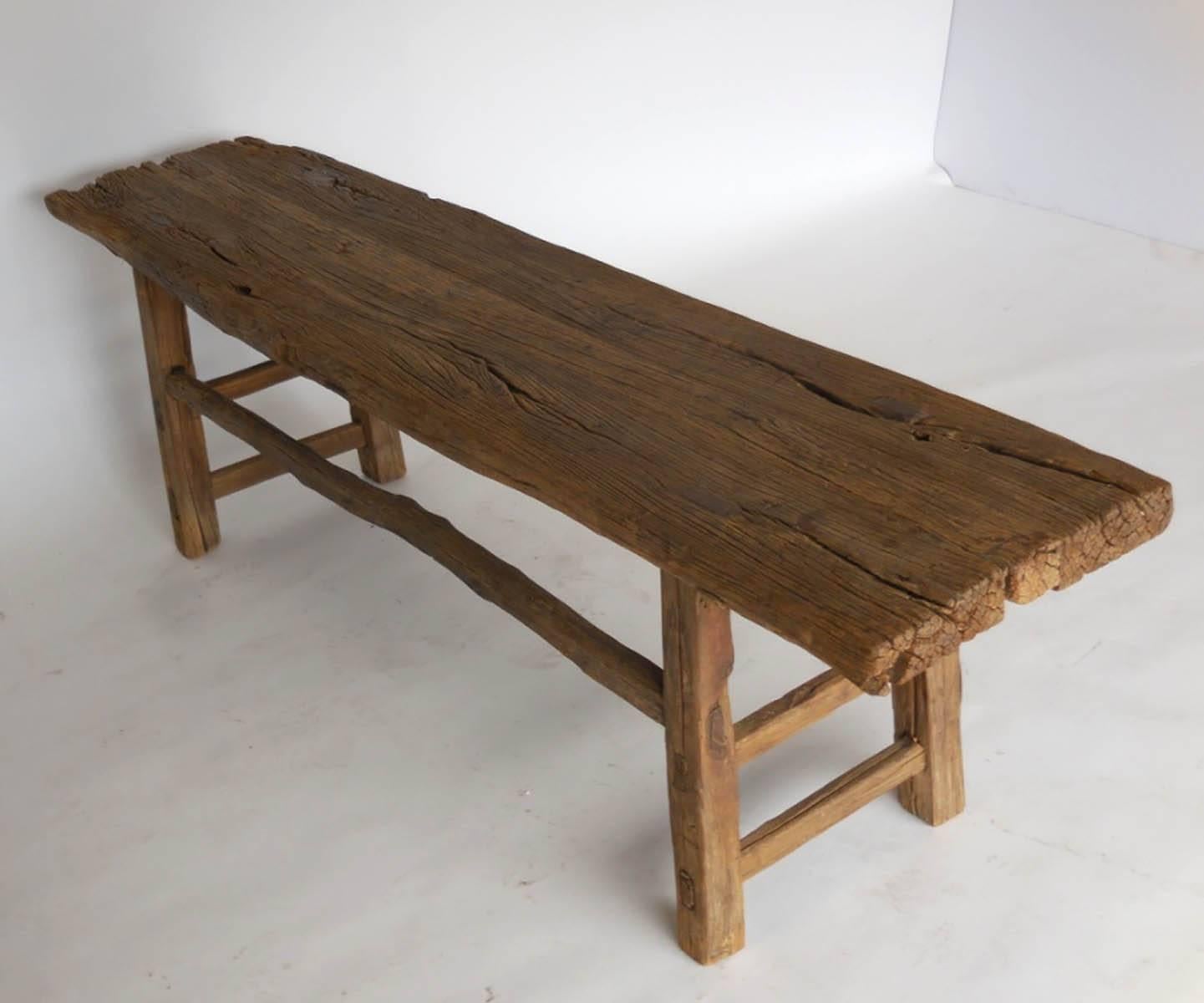 Beautiful Elm bench with natural branch stretchers. Mortise and tenon construction, beautiful old wood. Sturdy and functional.