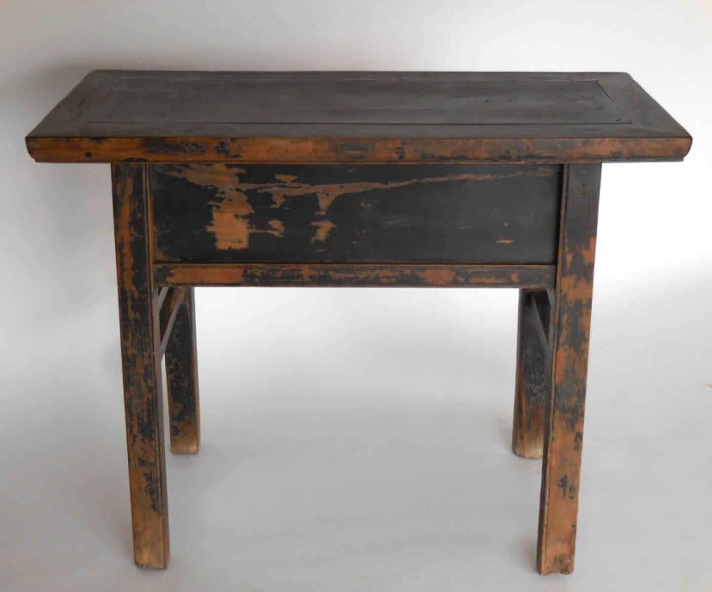 18th century painted elm console with framed top and one drawer with cut-out painted motif. Hand-hammered nails and dovetail construction. Beautiful patina throughout. Completely functional.