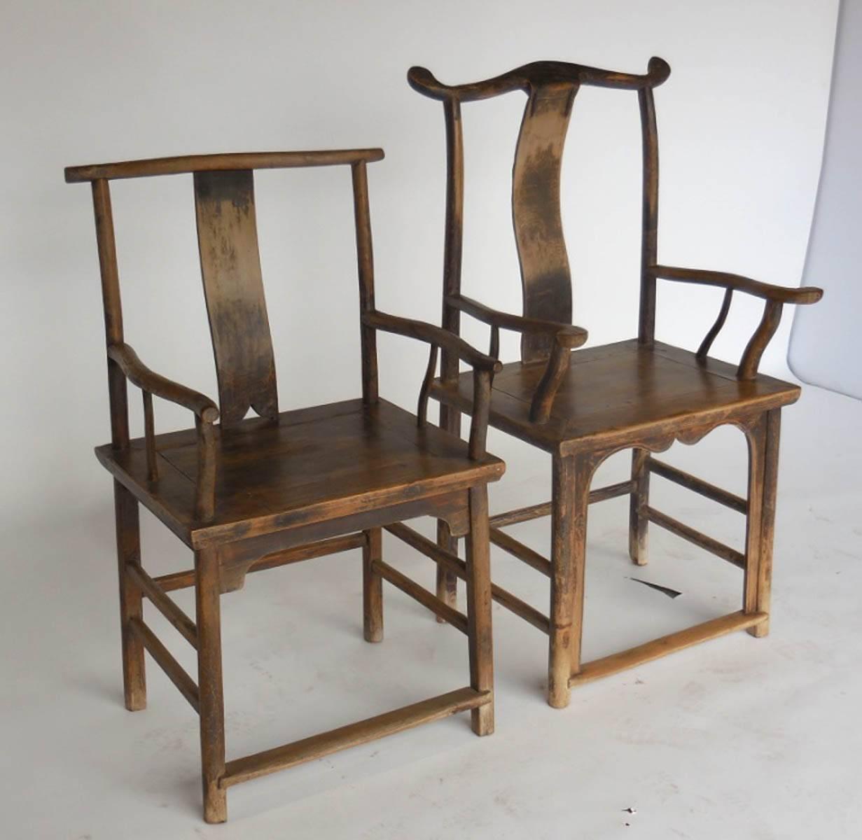 Striking pair of woman and man's chairs in elmwood in very good condition. Handsome. bentwood, branch like, with naturally aged patina. Some old repairs add to character. Mortise and tenon construction, hand-carved. Substantial and in very good