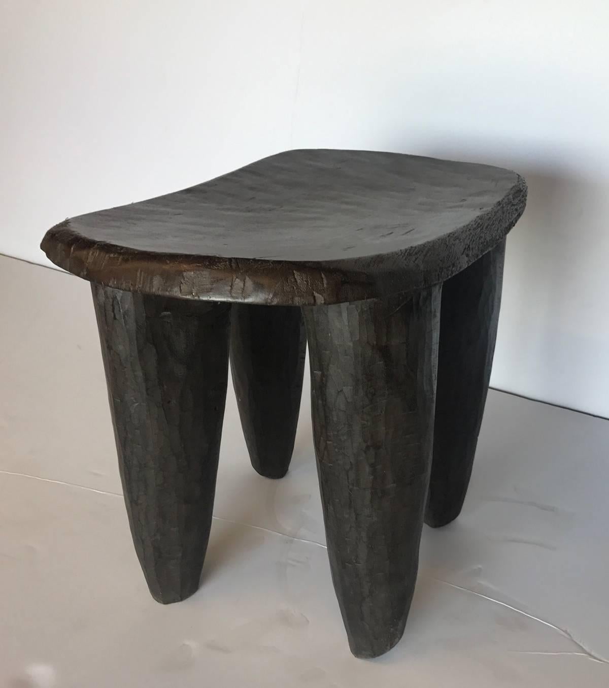 Antique hand-carved iroko wood stool or small table from the Sinufo tribe in Mali. Soft and smooth patina. Comfortable to sit on or perfect as a side table. Have a similar stool in stock to make a pair, please see photo.