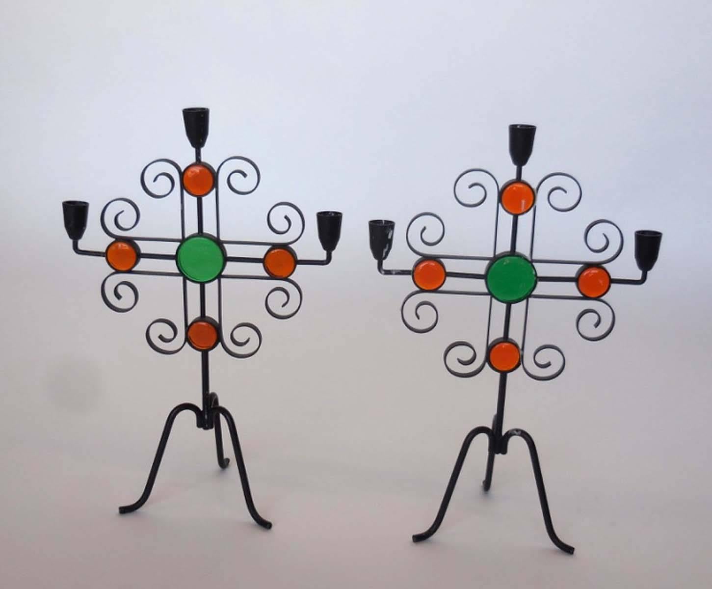 Created by Gunnar Ander in Sweden, circa 1960. Fanciful, colorful Midcentury candelabras. The whimsical look of the seven together can work in a variety of decorative styles. Can be sold by the pair as well.