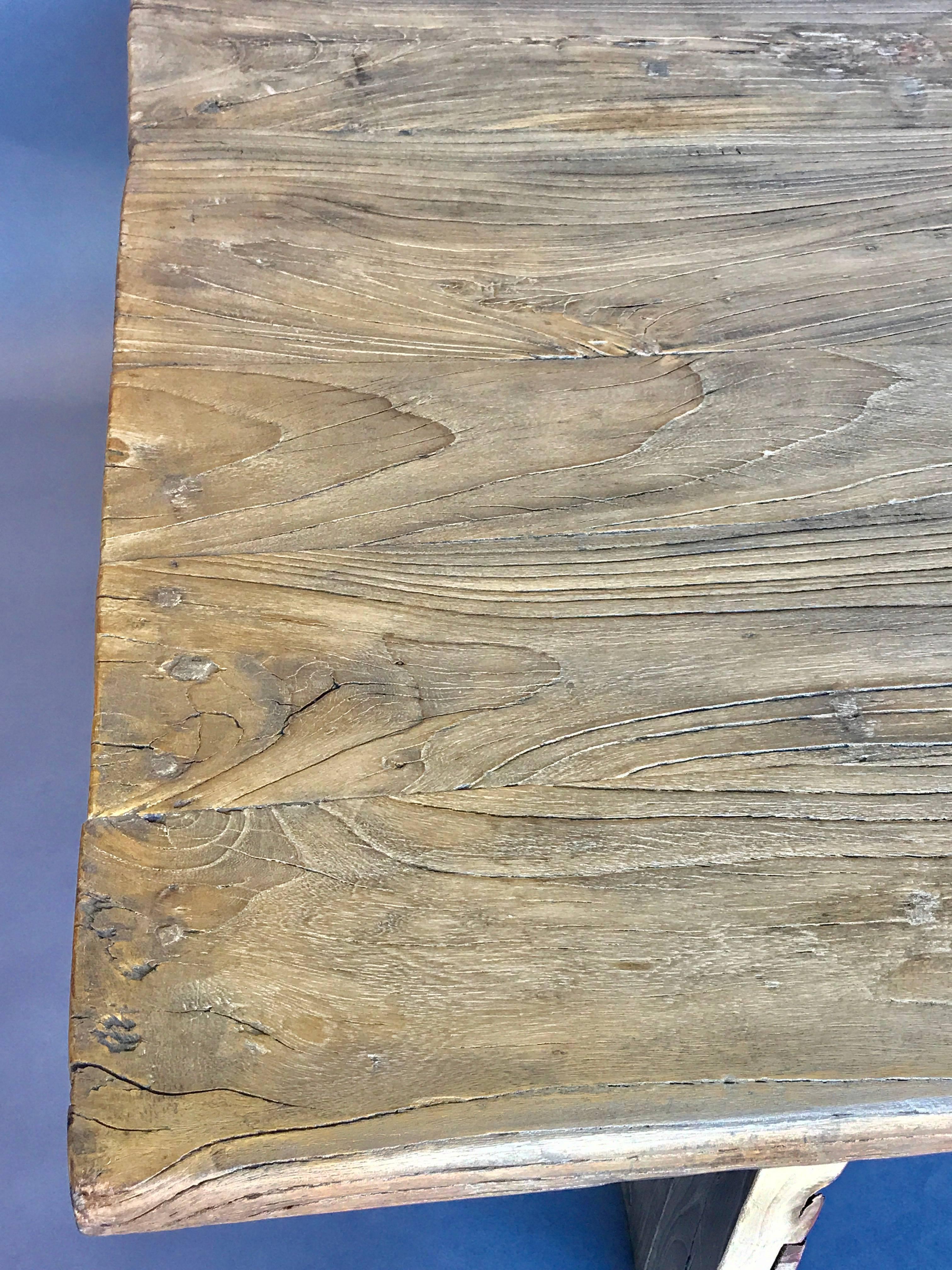 200 year old Japanese Elm cocktail in a simple modern design. Natural weathered patina that is very smooth to the touch. One long stretcher. The graining of the wood is fantastic with a wonderful texture. Made in Los Angeles by Dos Gallos Studio.