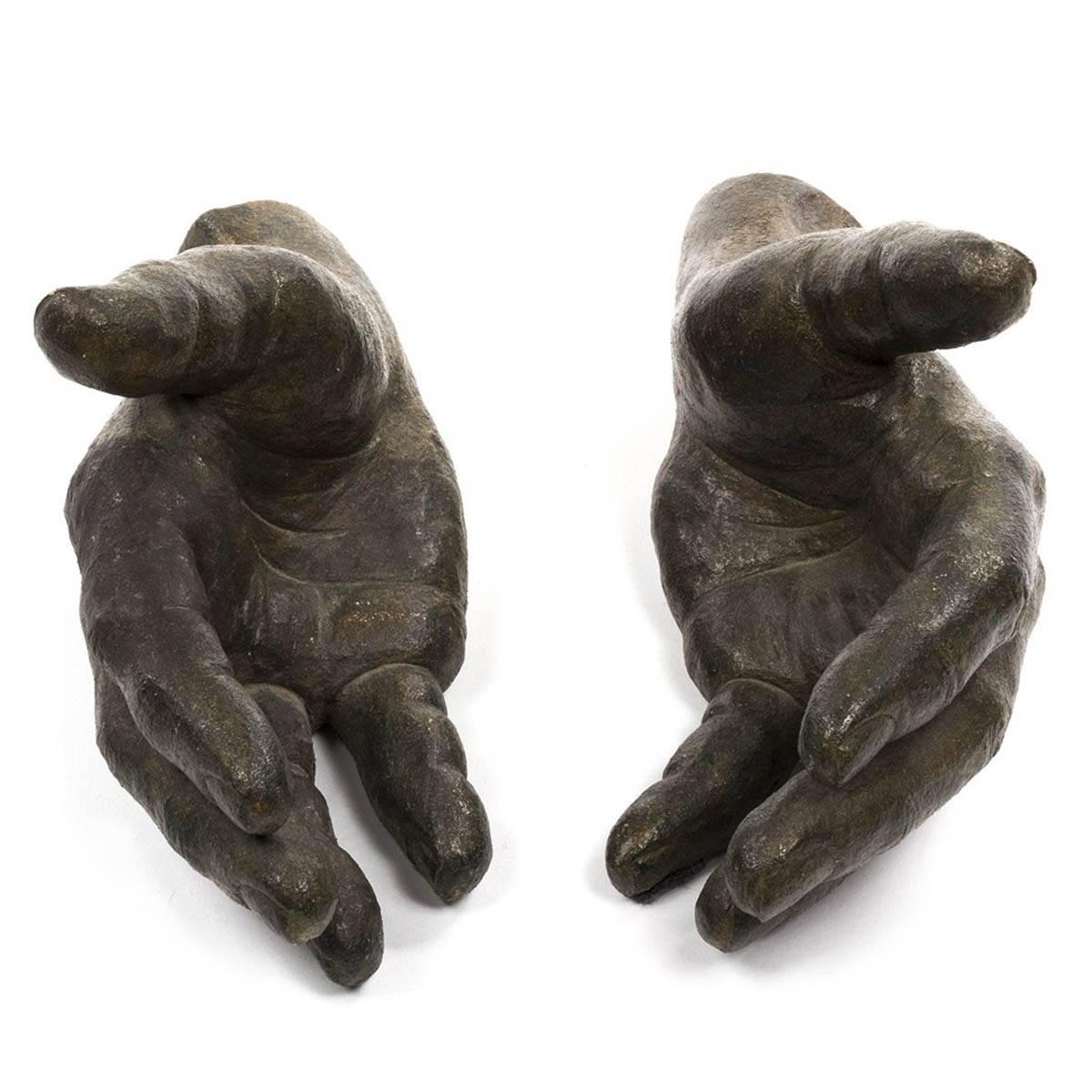 Pair of ceramic hands with bronze finish by Clara Wine, 1974.
