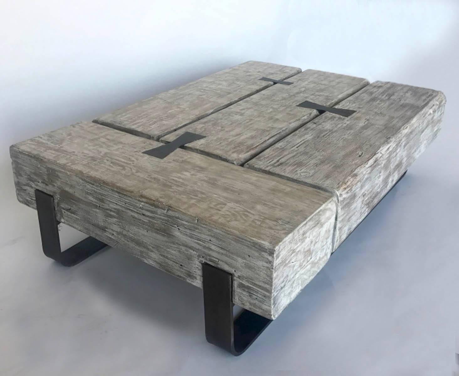 Reclaimed beam coffee table with iron mariposas (butterflies) and hand-forged iron base.
Grey/white finish.
Made in Los Angeles by Dos Gallos Studio.
 