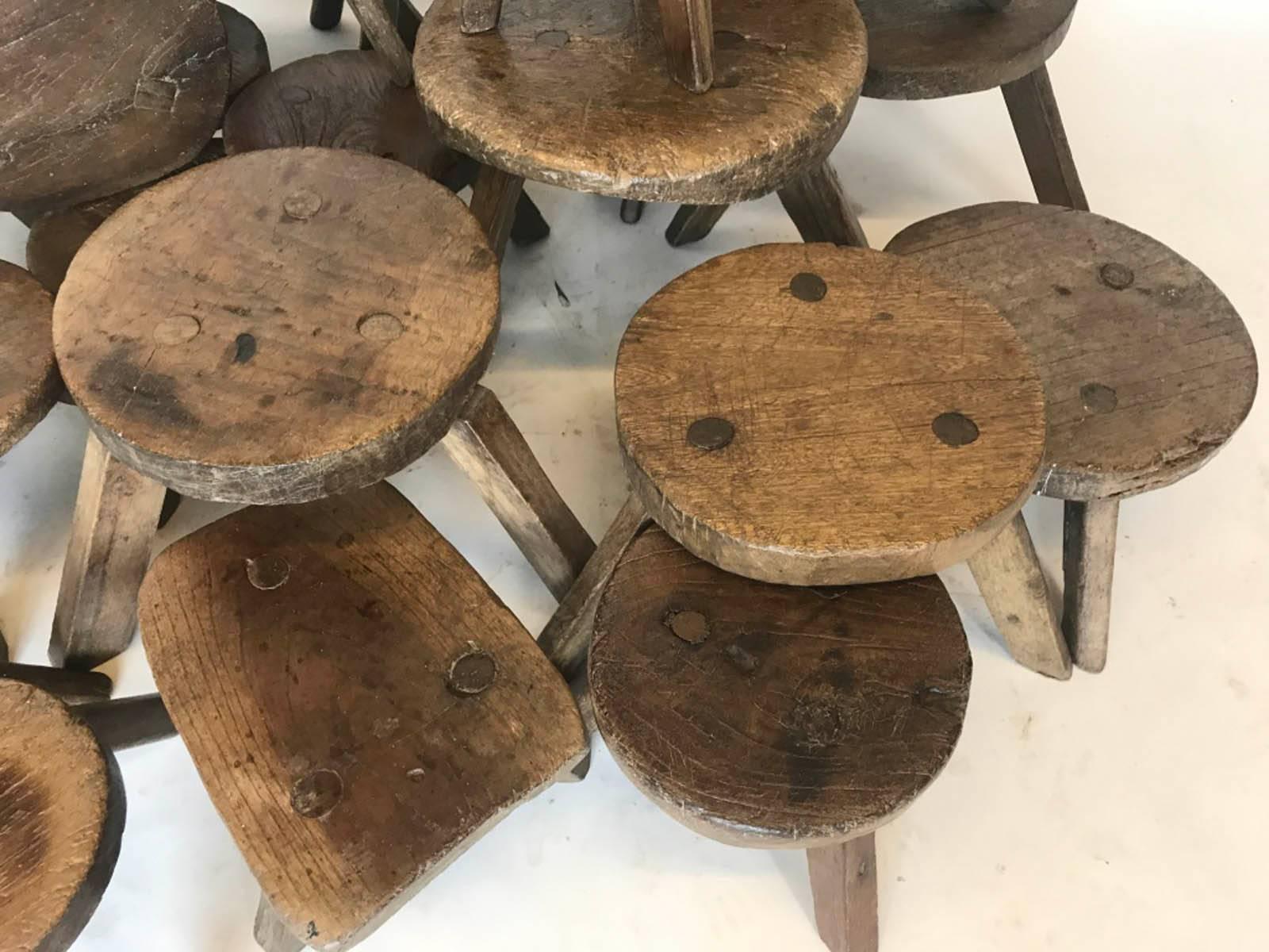 antique milking stools
