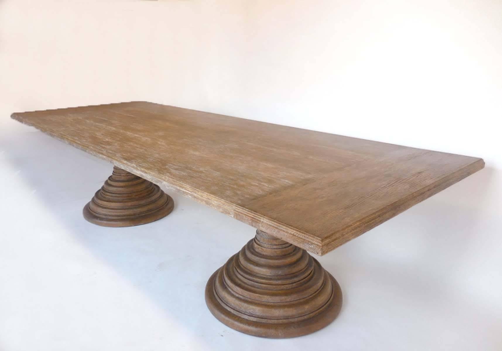 Custom beehive pedestal table in solid oak. Rectangular top is rift oak with an ogee edge. Finished in a cerused driftwood finish, open grain. This table can be made custom in any size and finish, in oak, mahogany or walnut.
Handmade in Los Angeles