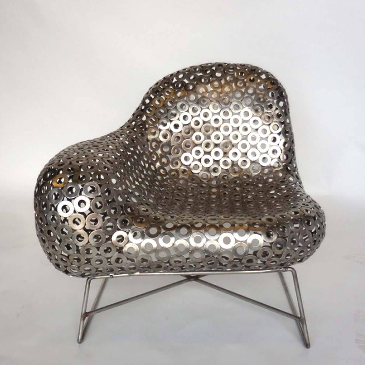 A 2011 side chair made by artist John Andrews. Made from stainless steel washers. Works great indoor or outside.
Handmade.