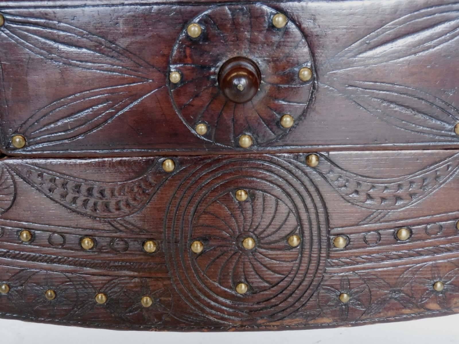 Where colonial Spain and indigenous Guatemala meets, here is a Nahuala (animal spirit) table with carved lion foot front legs and animal inspired carvings and typical Spanish Colonial turned back legs. Three drawers, all dove tail construction.