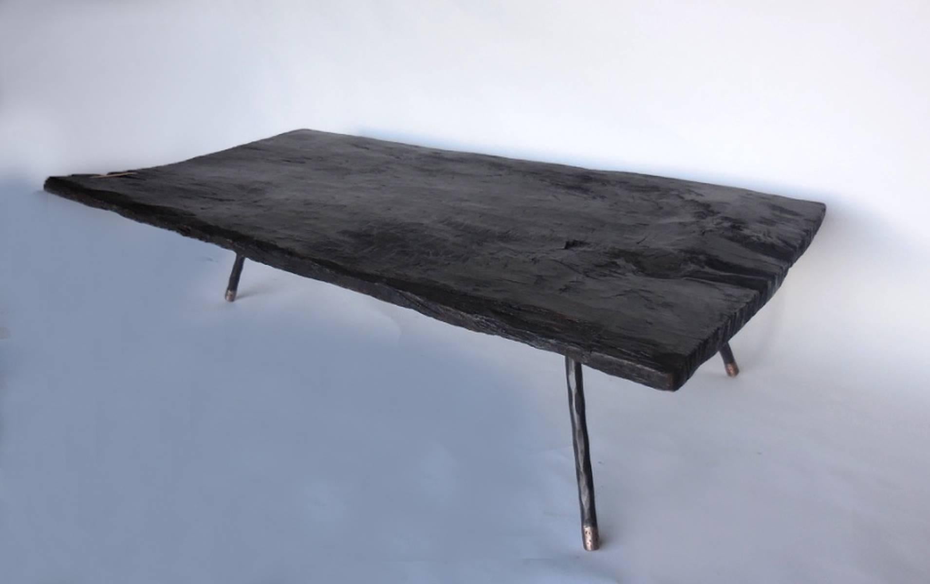 Guatemalan Wide Plank Ebonized Coffee Table with Three Iron and Bronze Legs