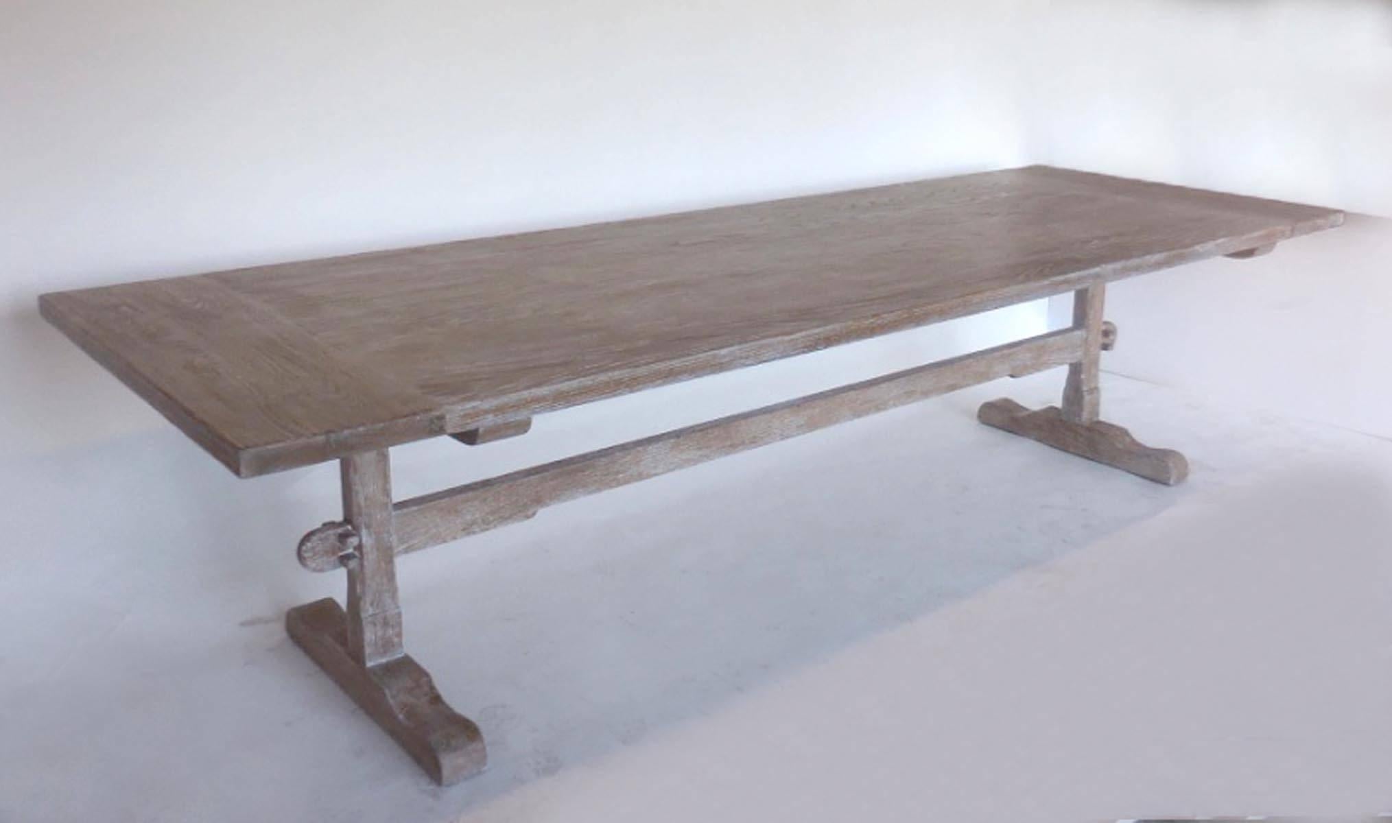 Custom classic trestle table in oak with an opened grain ceruse finish, done in a snow on sand color. Wide breadboards, delicate features. Beautiful. Top thickness is about one and three quarters thick.
Can be made in any size and finish, in oak,