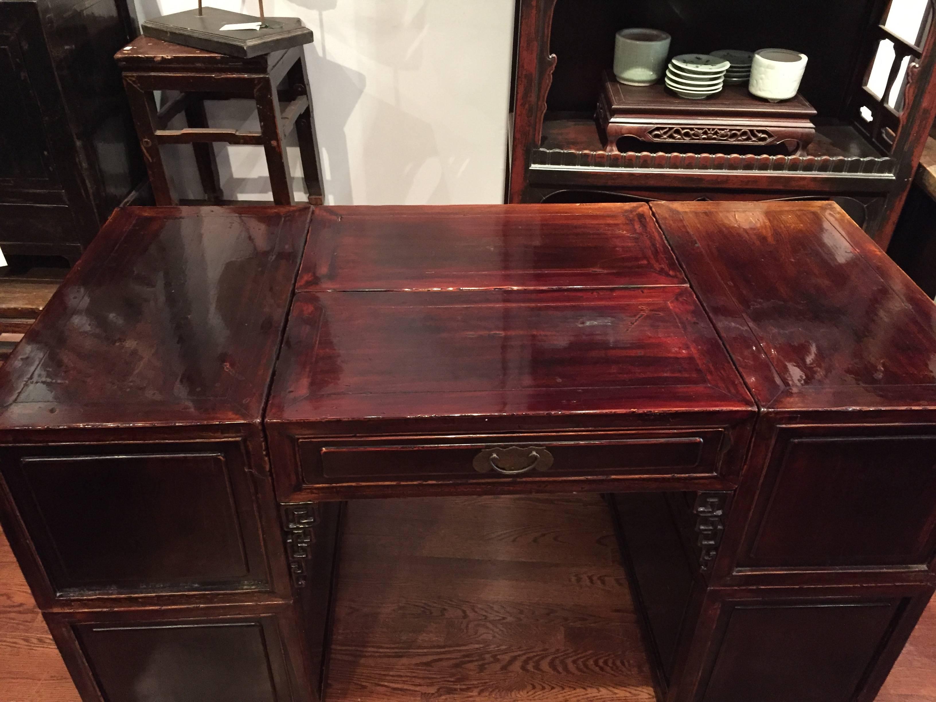 Mid to late 19th century. Q’ing Dynasty southern Chinese elm partner’s desk in six parts.