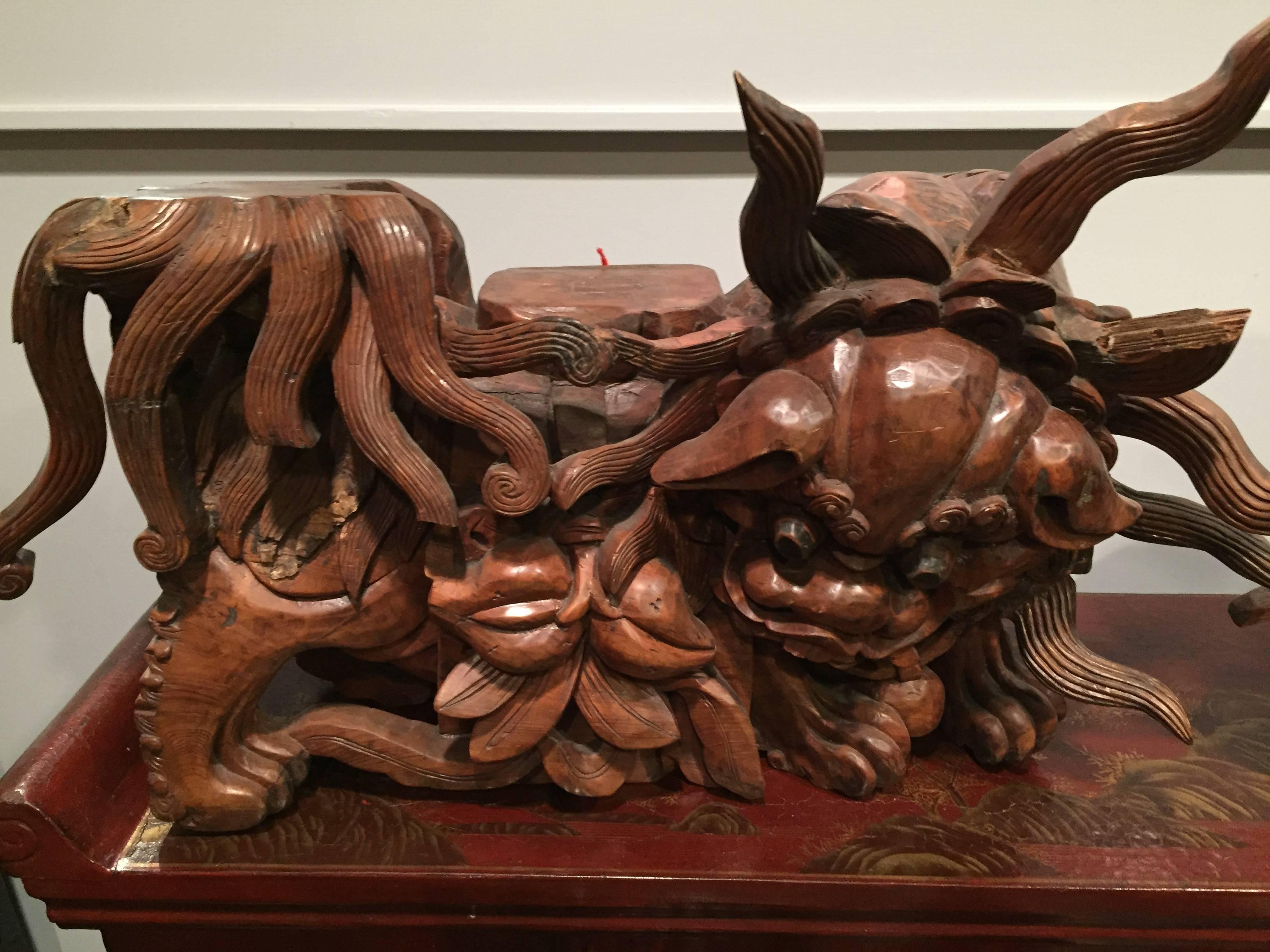 19th Century Qing Dynasty Carved Temple Foo Dogs For Sale 1