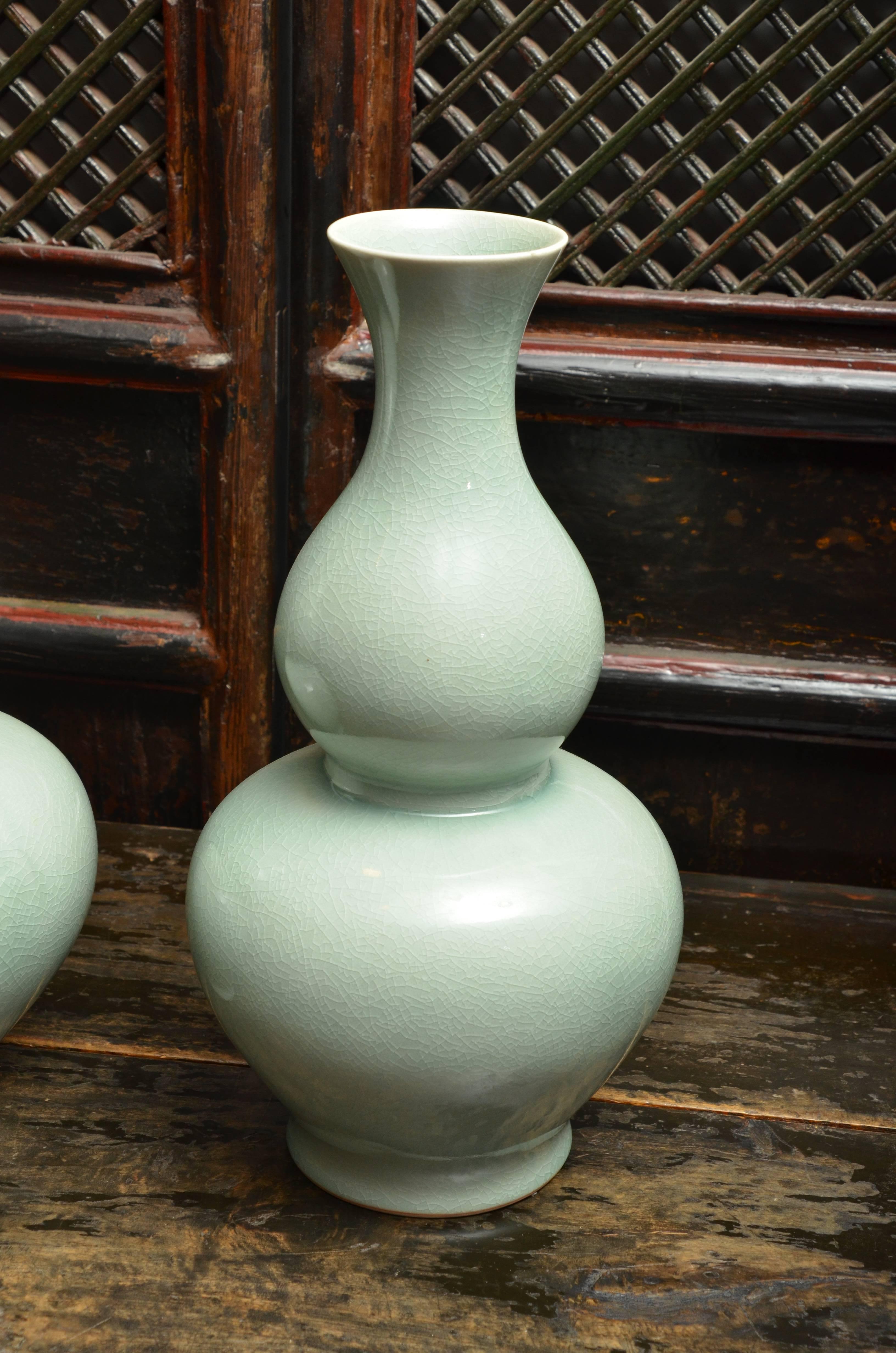 Mid-Century Chinese celadon gourd vase (pair available, priced and sold separately).
