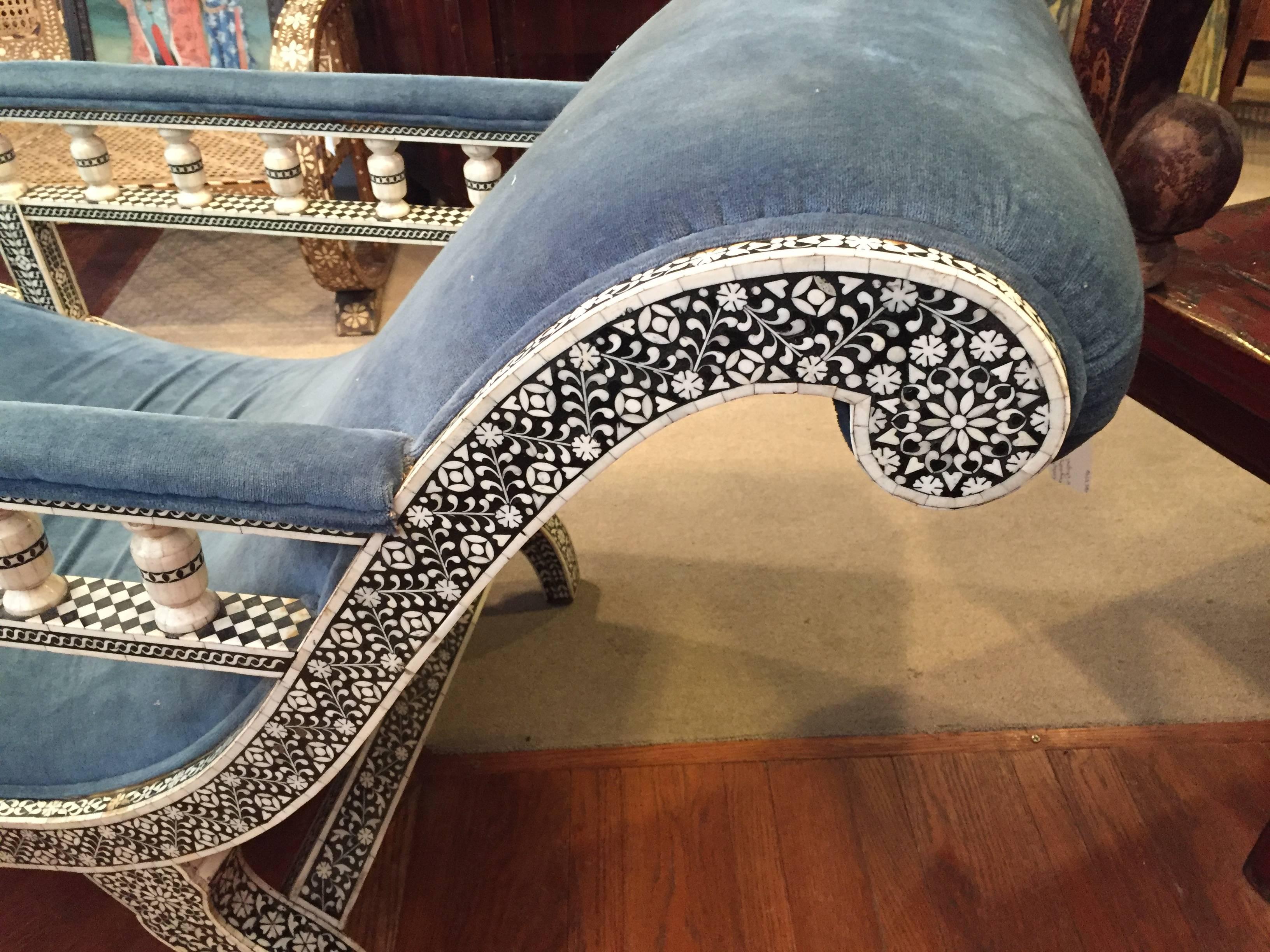 Late 19th century, Anglo-Indian horn and bone inlaid velvet covered chaise longue.
