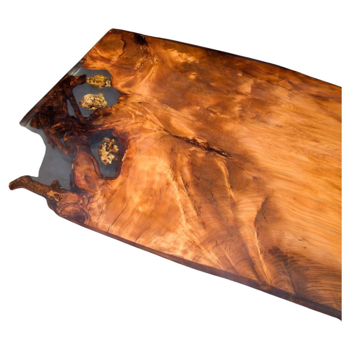 Modern Kauri dining table made from solid Ancient Swamp Kauri wood.

A live edge Kauri dining table made from New Zealand 50,000-year-old Ancient Swamp Kauri. Hand-crafted in Auckland, New Zealand from a single piece of Ancient Swamp Kauri. The