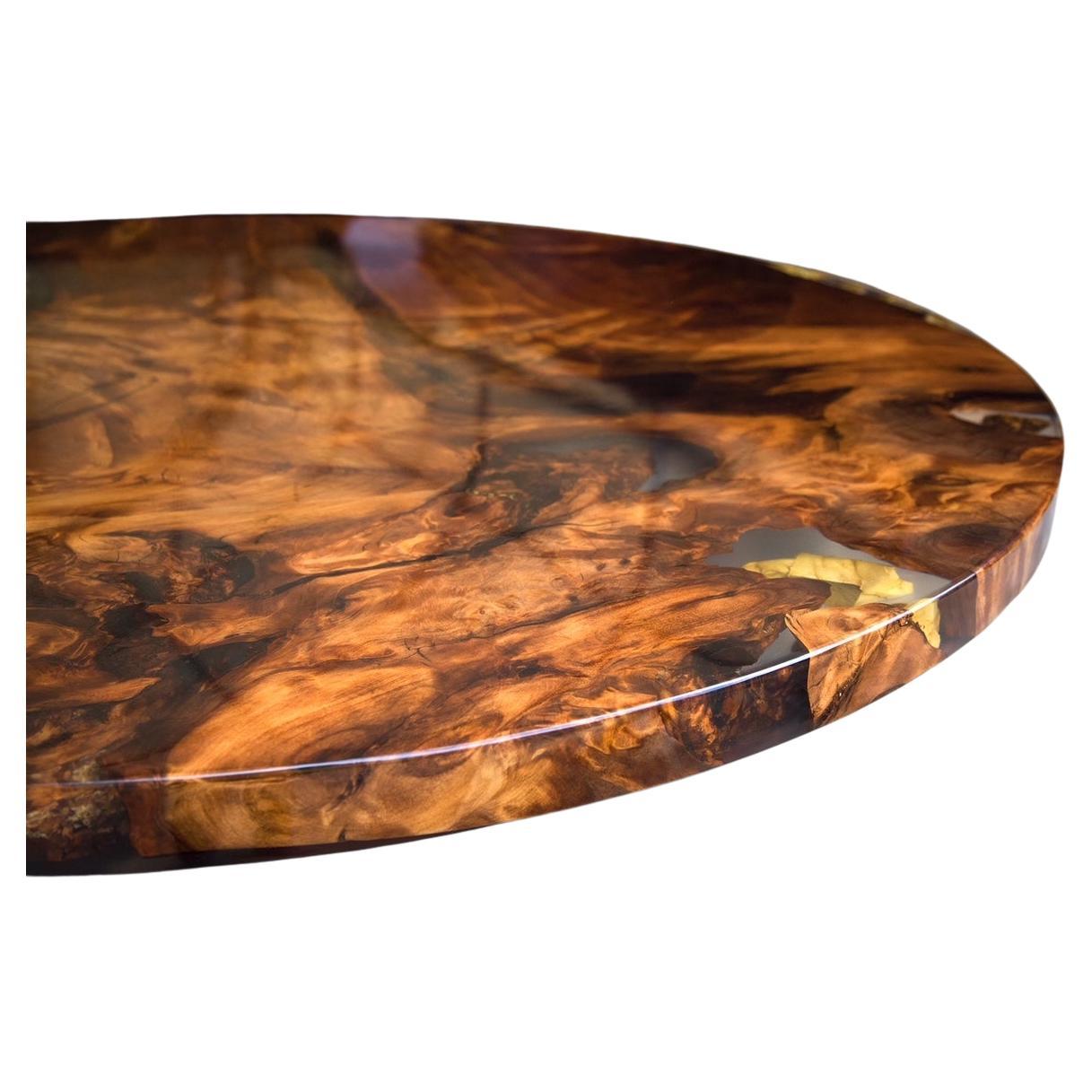 Modern Kauri dining table made from solid Ancient Swamp Kauri wood.

A live edge Kauri dining table made from New Zealand 50,000-year-old Ancient Swamp Kauri. Hand-crafted in Auckland, New Zealand from a single piece of Ancient Swamp Kauri. The