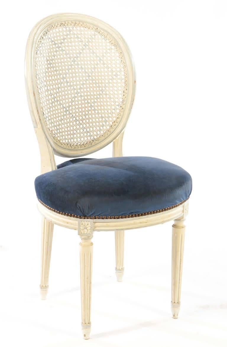 French Set of Eight Painted Balloon Back Dining Chairs in the Louis XVI Style